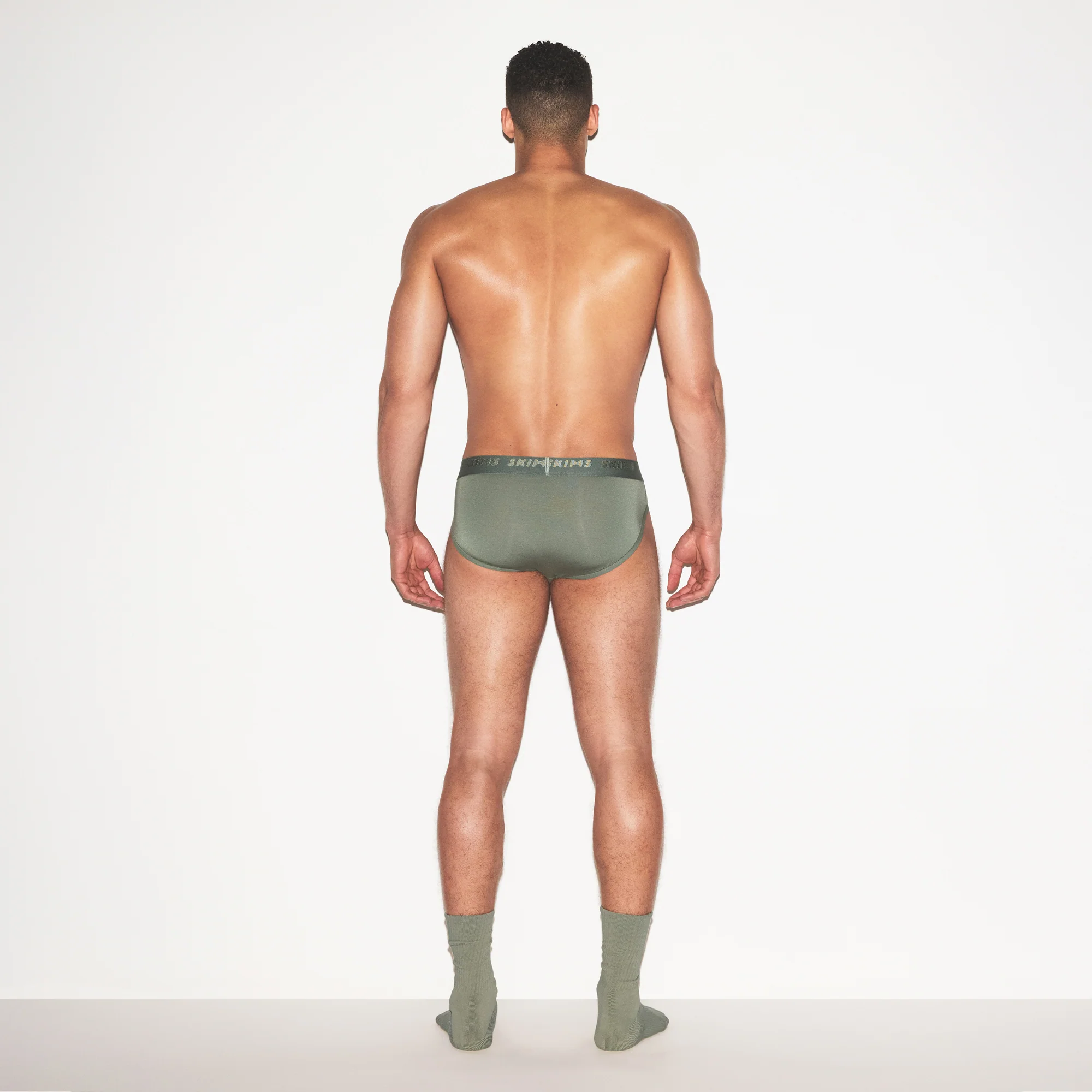 SKIMS STRETCH MENS BRIEF | LAUREL