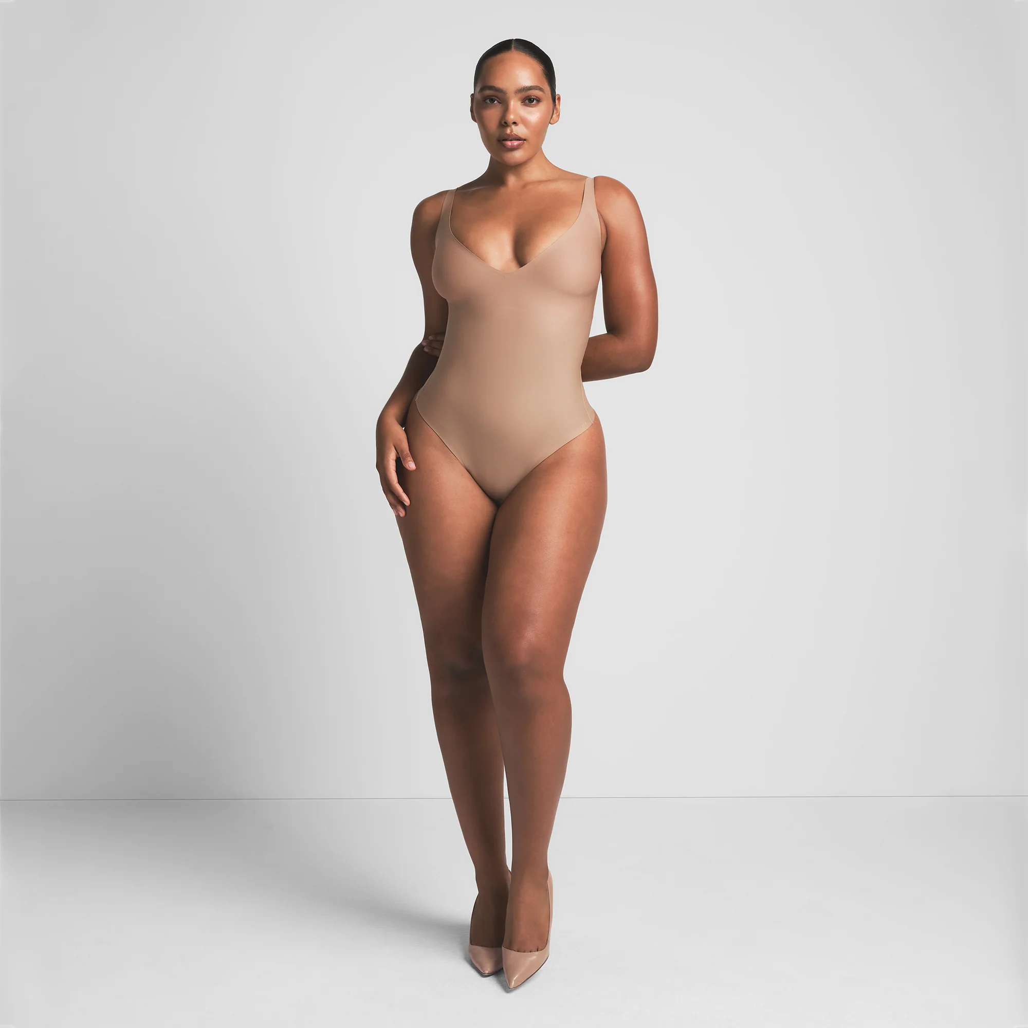 SKIMS BODY CORE SCULPT PLUNGE THONG BODYSUIT | SAND