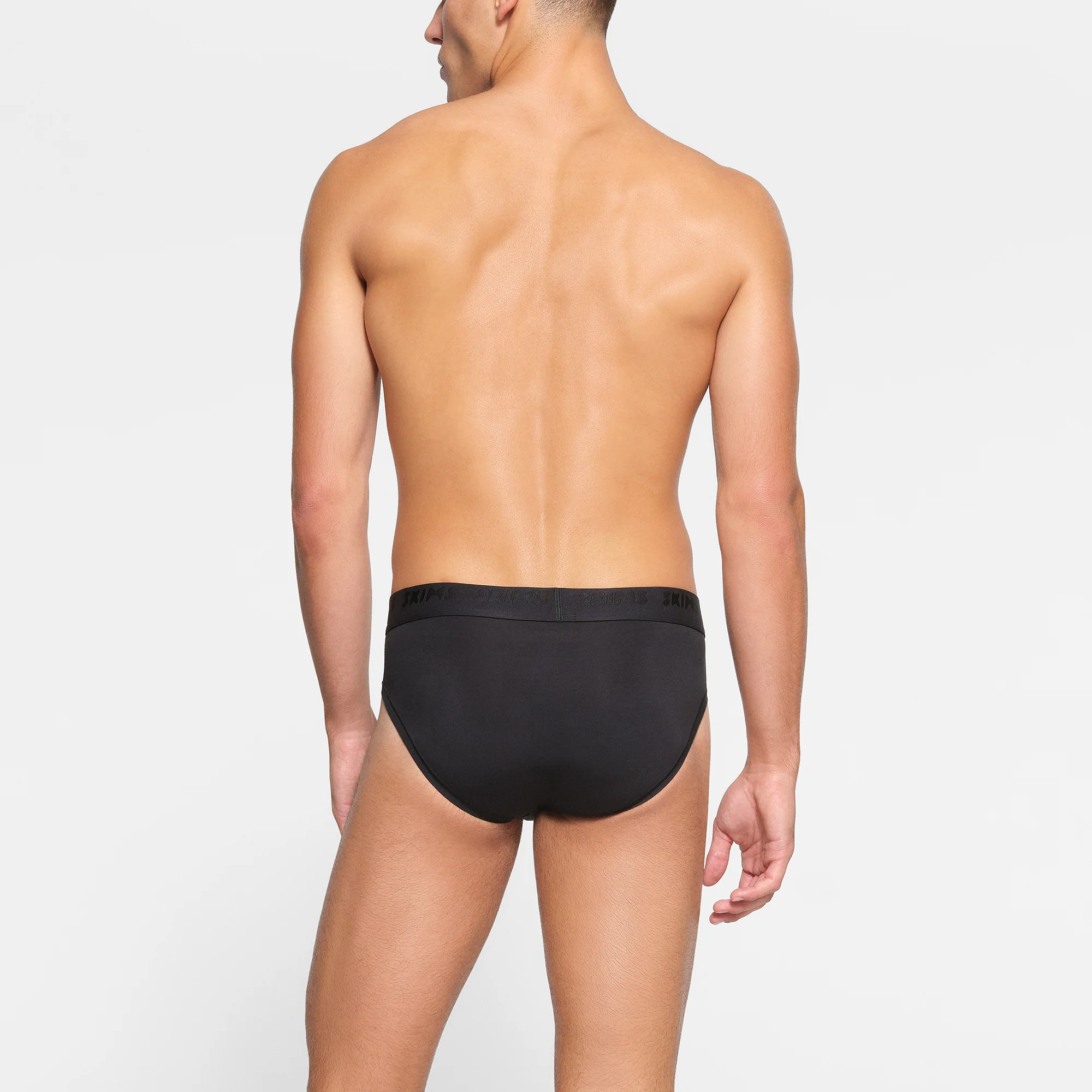 SKIMS STRETCH MENS BRIEF | OBSIDIAN