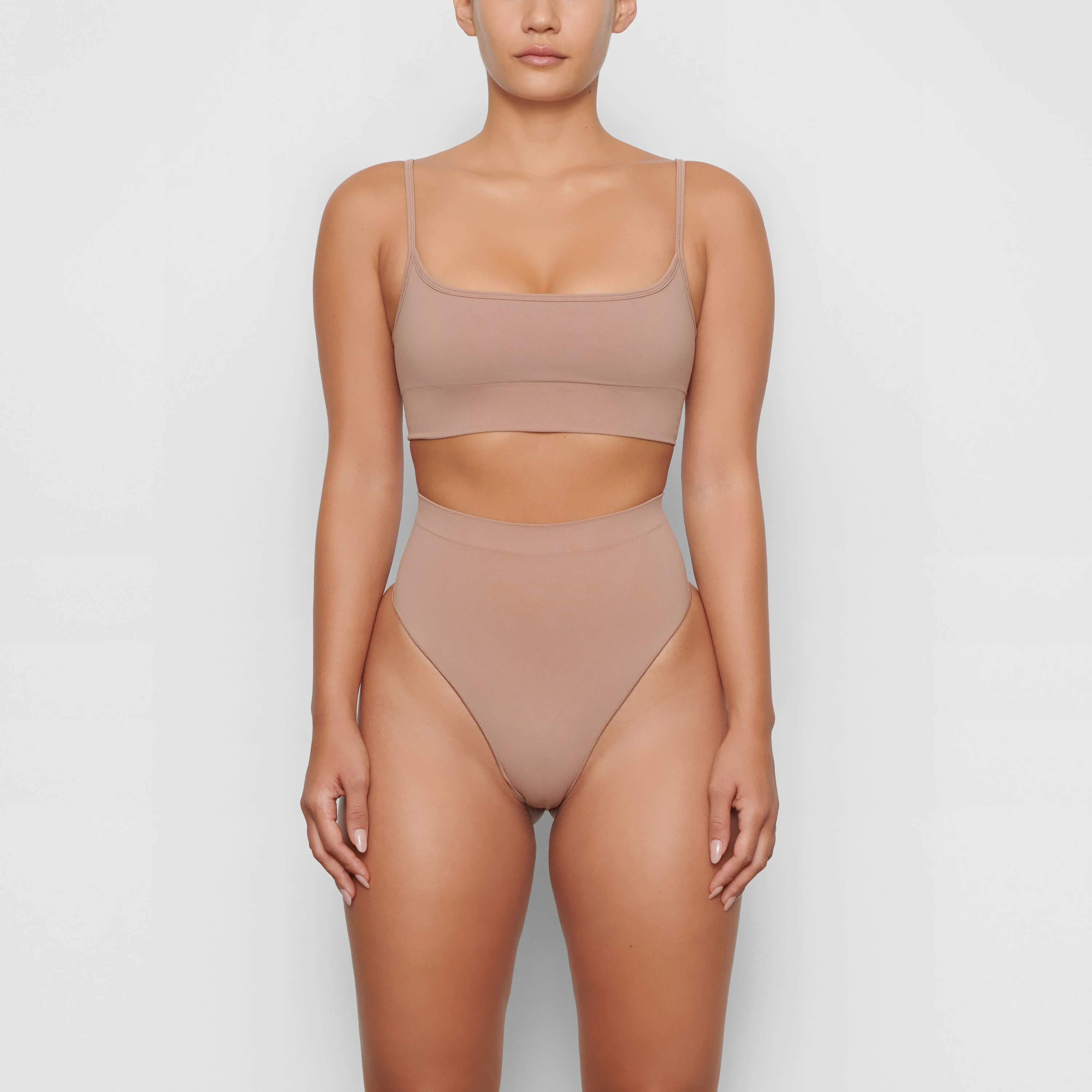 SEAMLESS SCULPT MID WAIST THONG | OCHRE