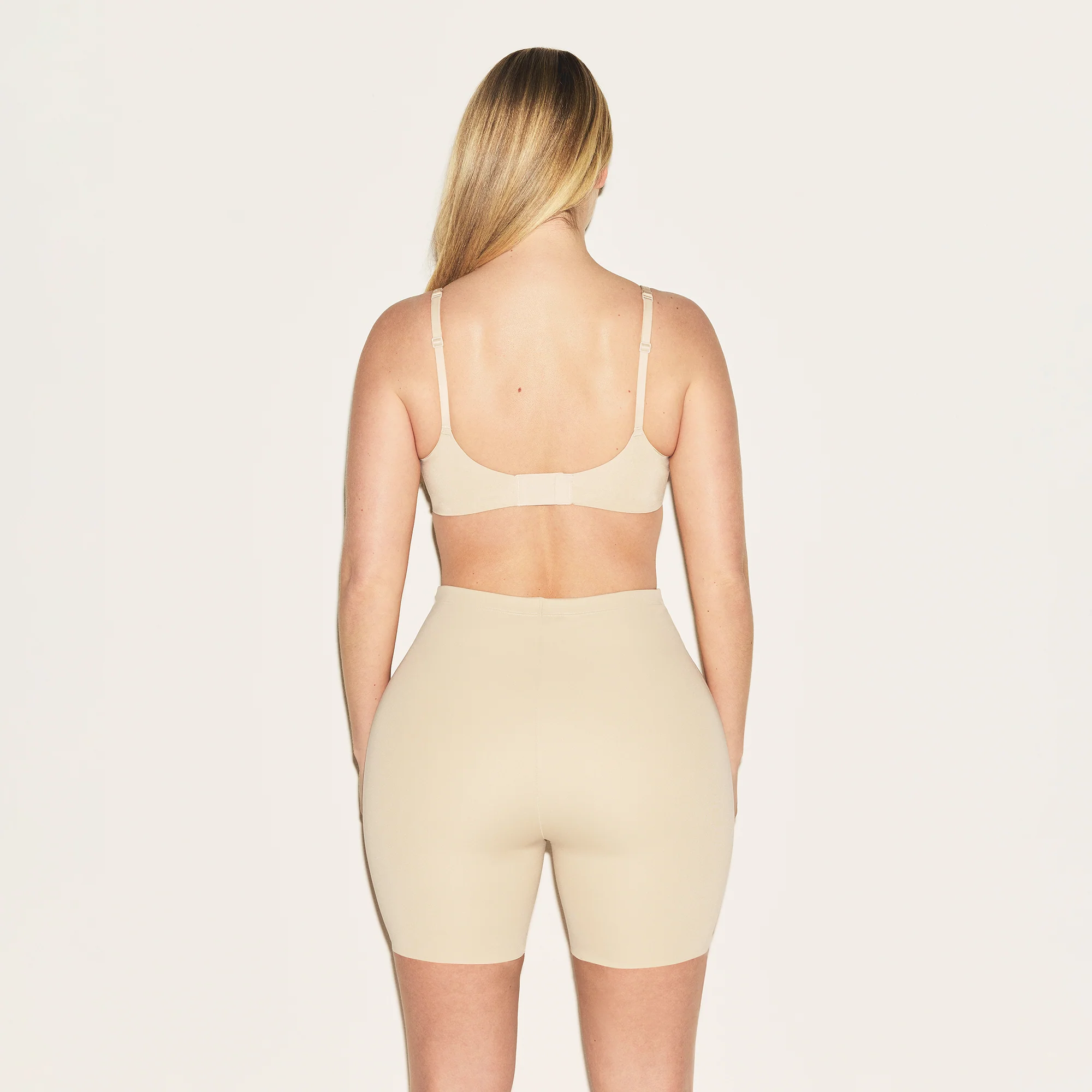 SKIMS BODY HIP ENHANCING PADDED SHORT | CLAY