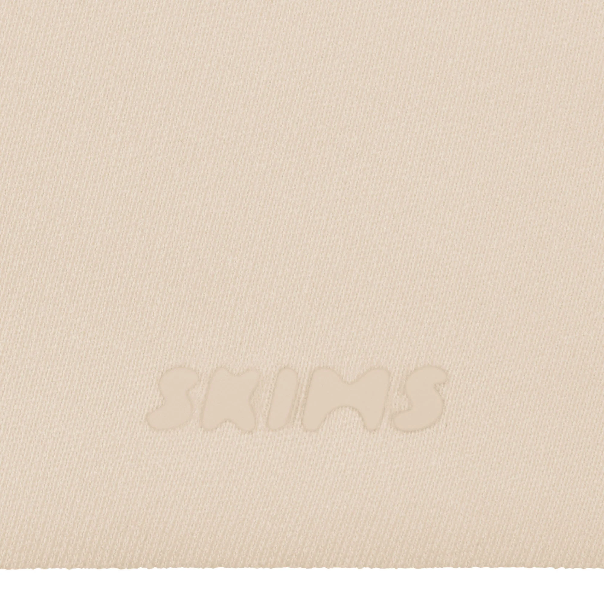 SKIMS ULTIMATE BODY PUSH-UP THONG BODYSUIT | ONYX