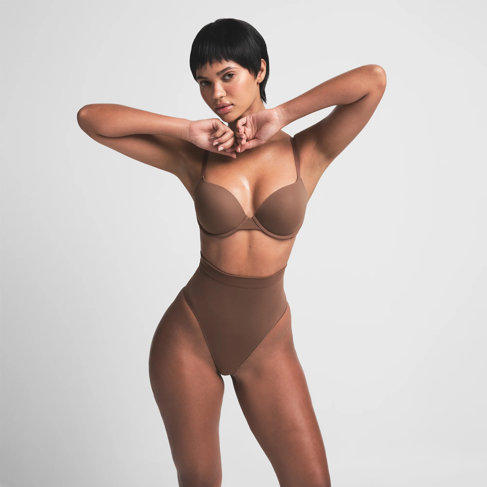 SEAMLESS SCULPT MID WAIST THONG | OCHRE