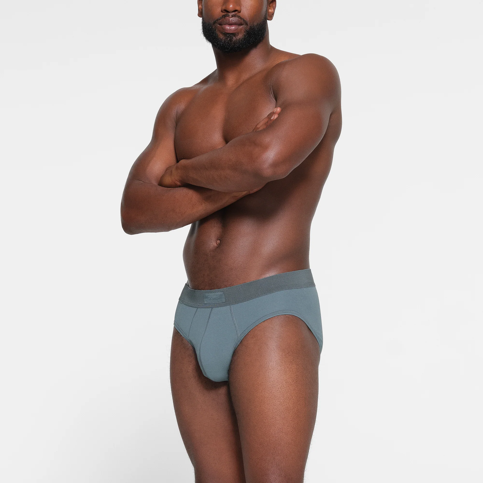 SKIMS COTTON MENS BRIEF | RUSSET
