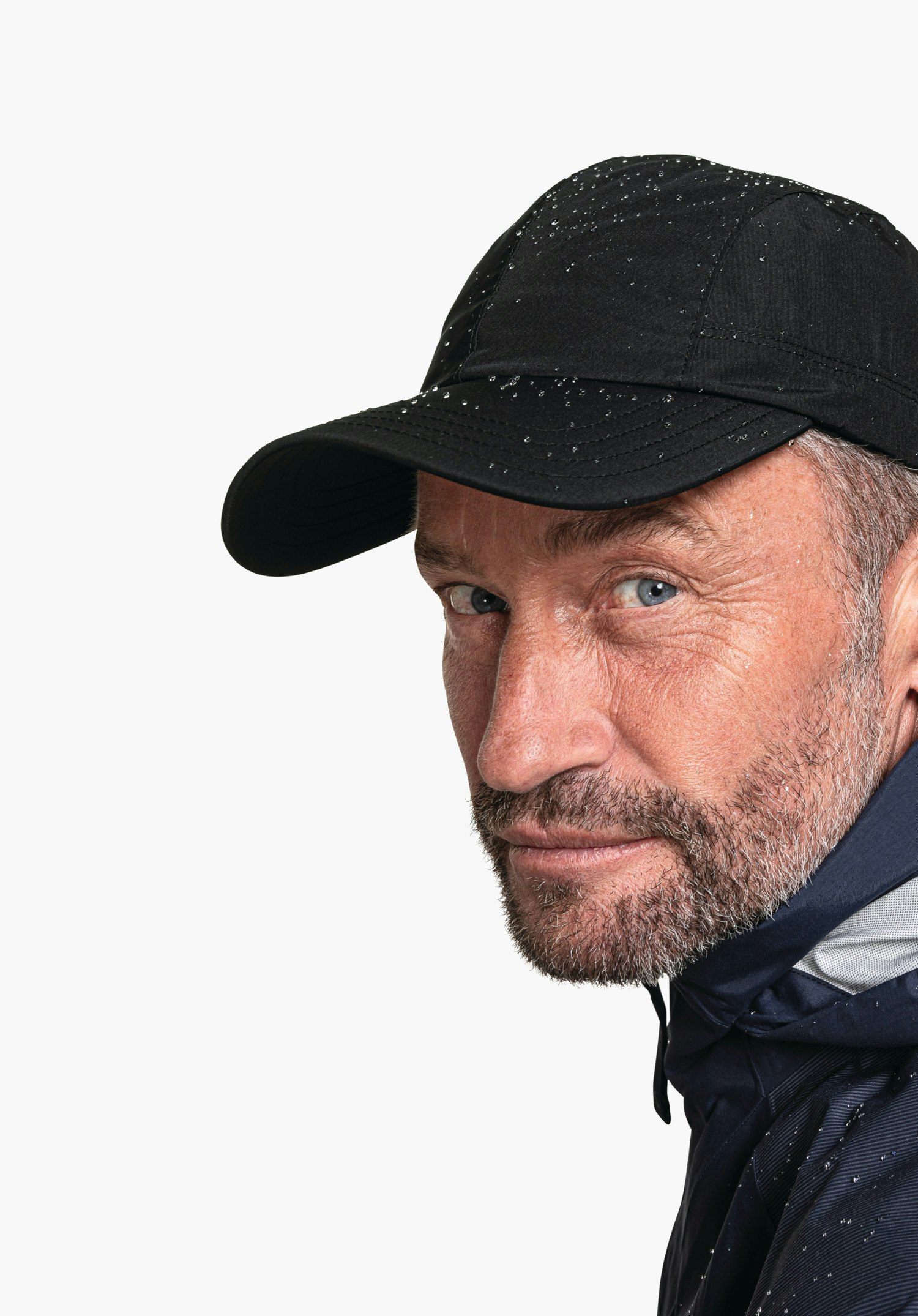 Wind- and waterproof rain cap