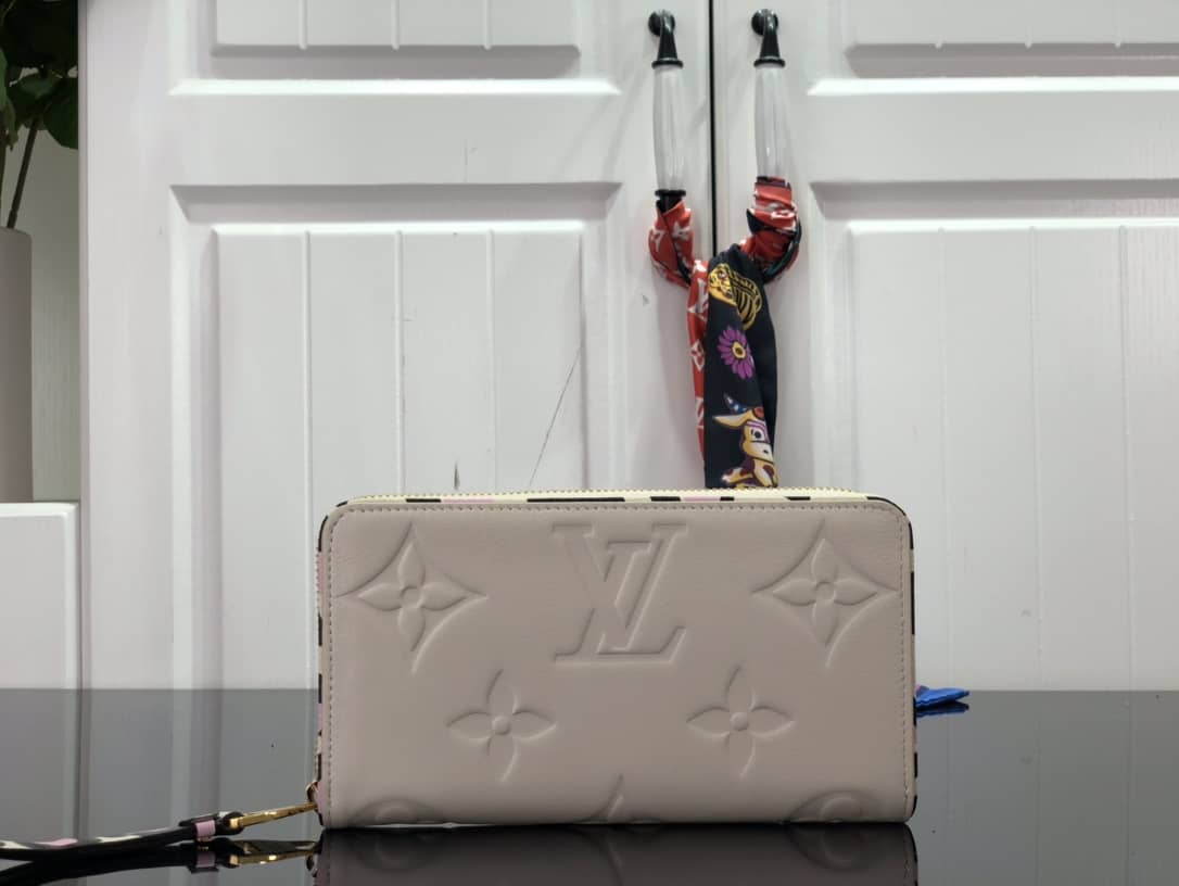 Best Replica Louis Vuitton Monogram Empreinte Leather with Animal-Print Zippy Wallet Replica White M80680 - Colareps