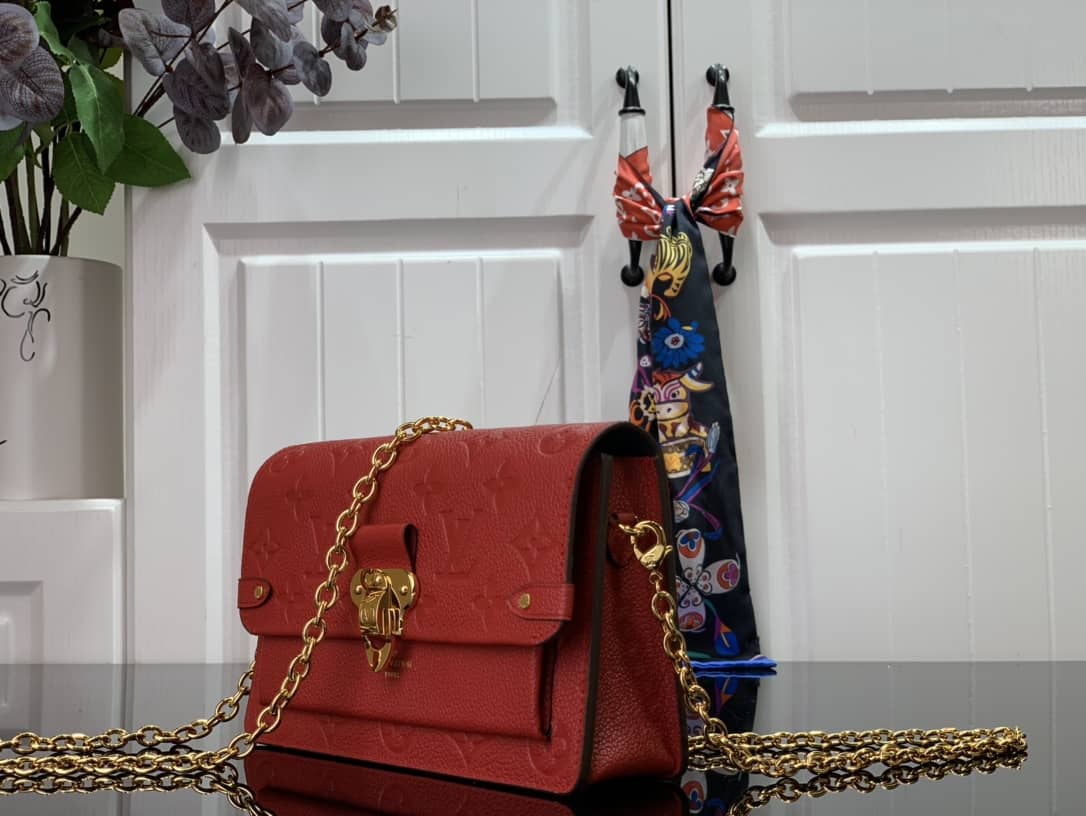 Best Replica Louis Vuitton Vavin Chain Empreinte Leather Replica Bag Red M63398 - Colareps