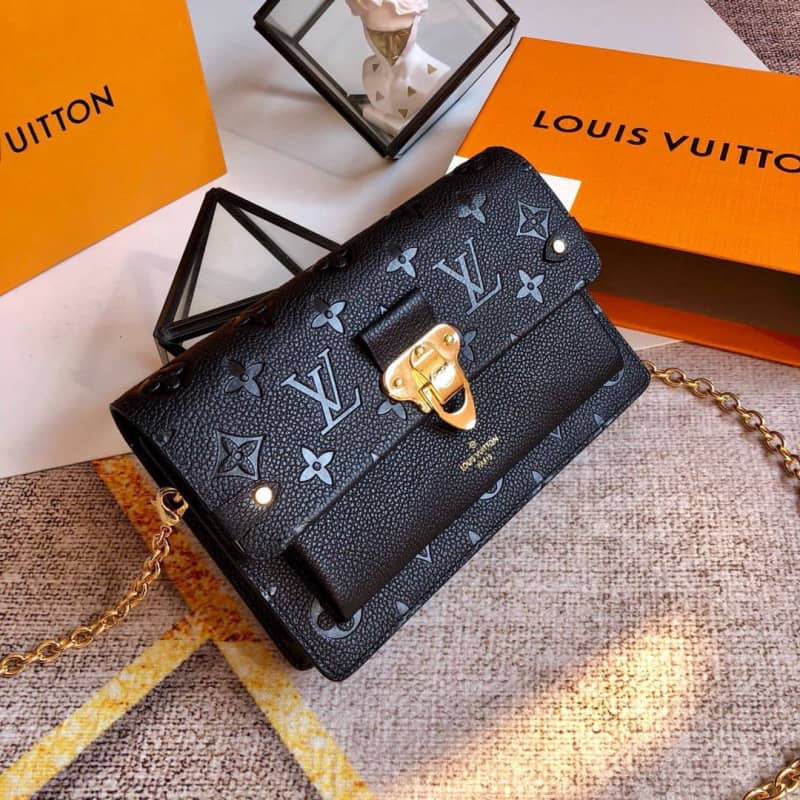 Best Replica Louis Vuitton Monogram Empreinte Vavin Chain Long Wallet Replica Black M67839 - Colareps