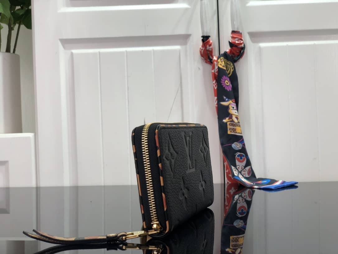 Best Replica Louis Vuitton Monogram Empreinte Leather with Animal-Print Zippy Wallet Replica Black M80680 - Colareps