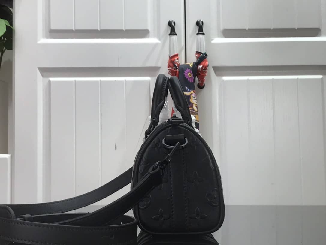 Best Replica Louis Vuitton Keepall XS Monogram Seal Cowhide Leather Bag Replica Black M57960 - Colareps