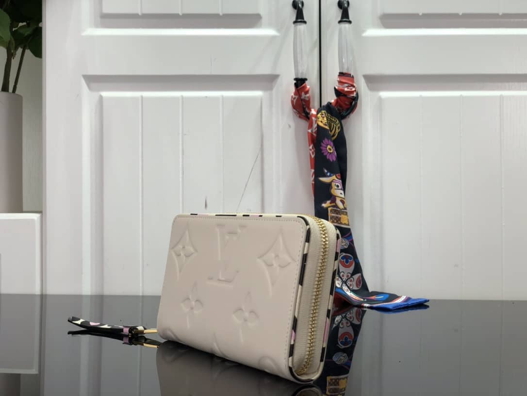 Best Replica Louis Vuitton Monogram Empreinte Leather with Animal-Print Zippy Wallet Replica White M80680 - Colareps