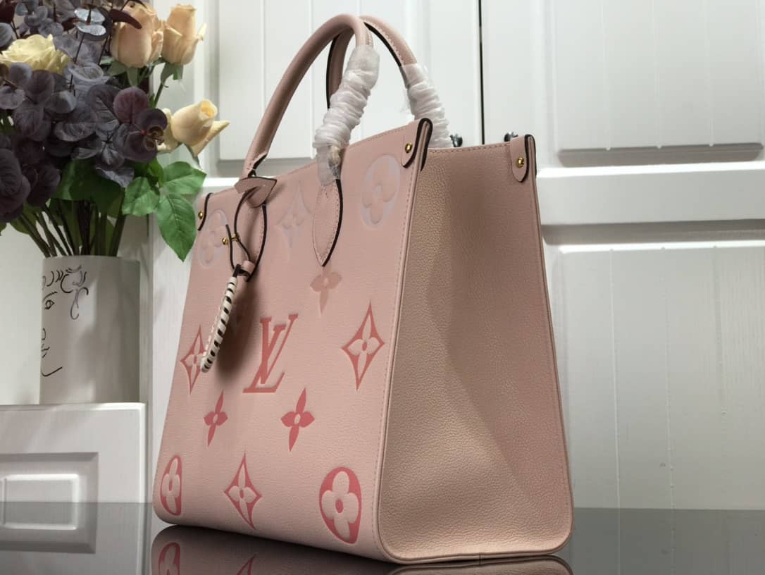 Best Replica Louis Vuitton On the Go MM Monogram Empreinte Two-way Tote Replica Pink M45717 - Colareps