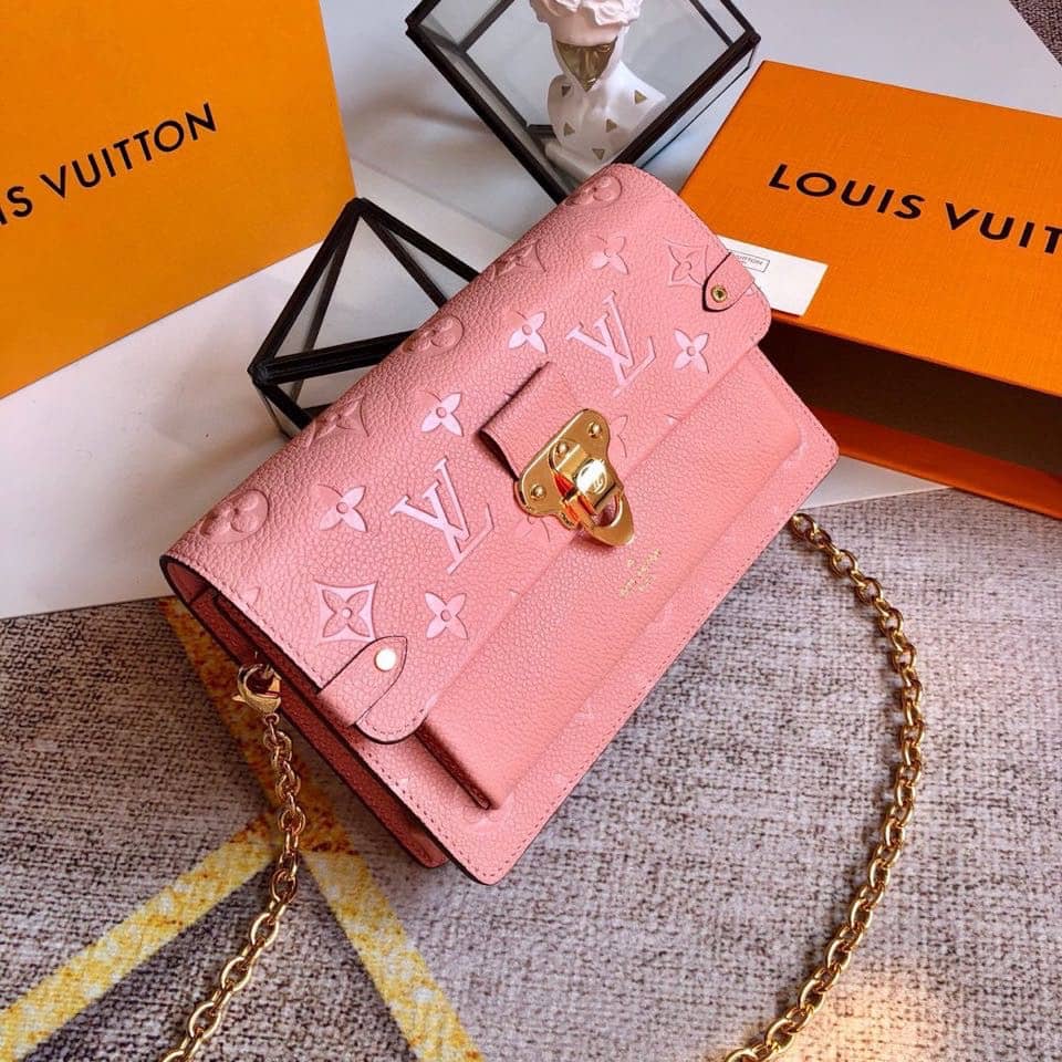 Best Replica Louis Vuitton Monogram Empreinte Vavin Chain Long Wallet Replica Pink M67839 - Colareps