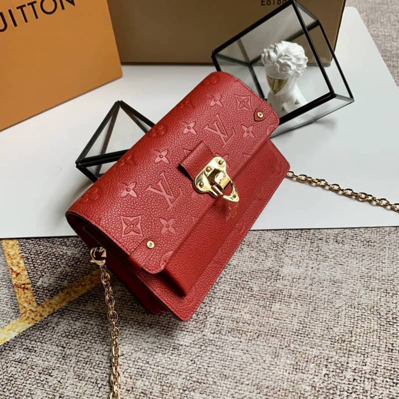 Best Replica Louis Vuitton Monogram Empreinte Vavin Chain Long Wallet Replica Red M67839 - Colareps