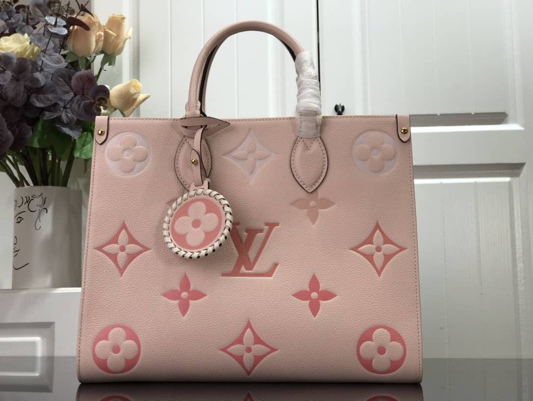 Best Replica Louis Vuitton On the Go MM Monogram Empreinte Two-way Tote Replica Pink M45717 - Colareps