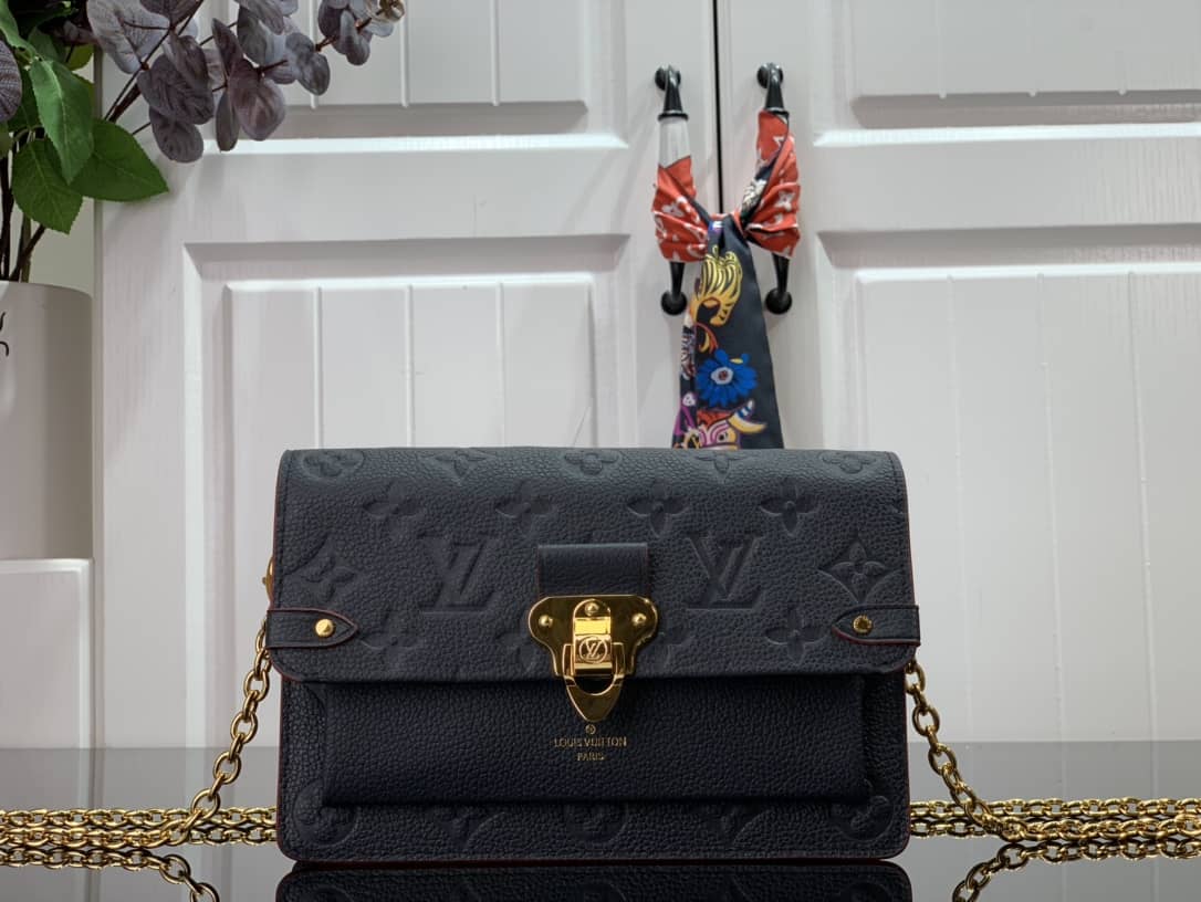 Best Replica Louis Vuitton Monogram Empreinte Vavin Chain Long Wallet Replica Black M67839 - Colareps