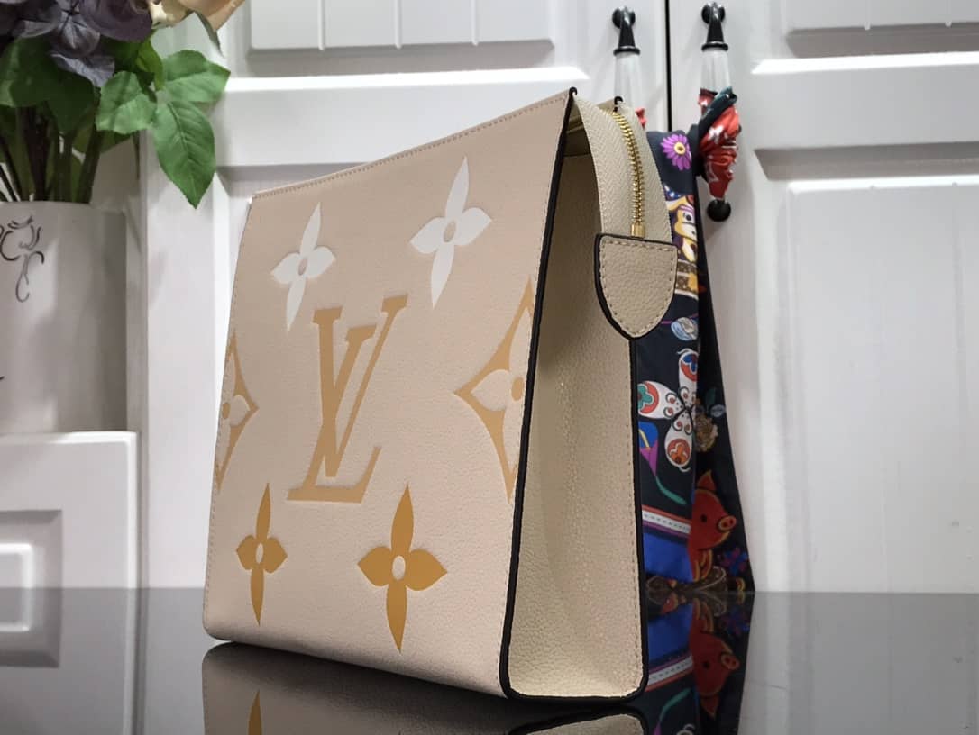 Best Replica Louis Vuitton Summer Toiletry Pouch Monogram Empreinte Replica Apricot M80504 - Colareps