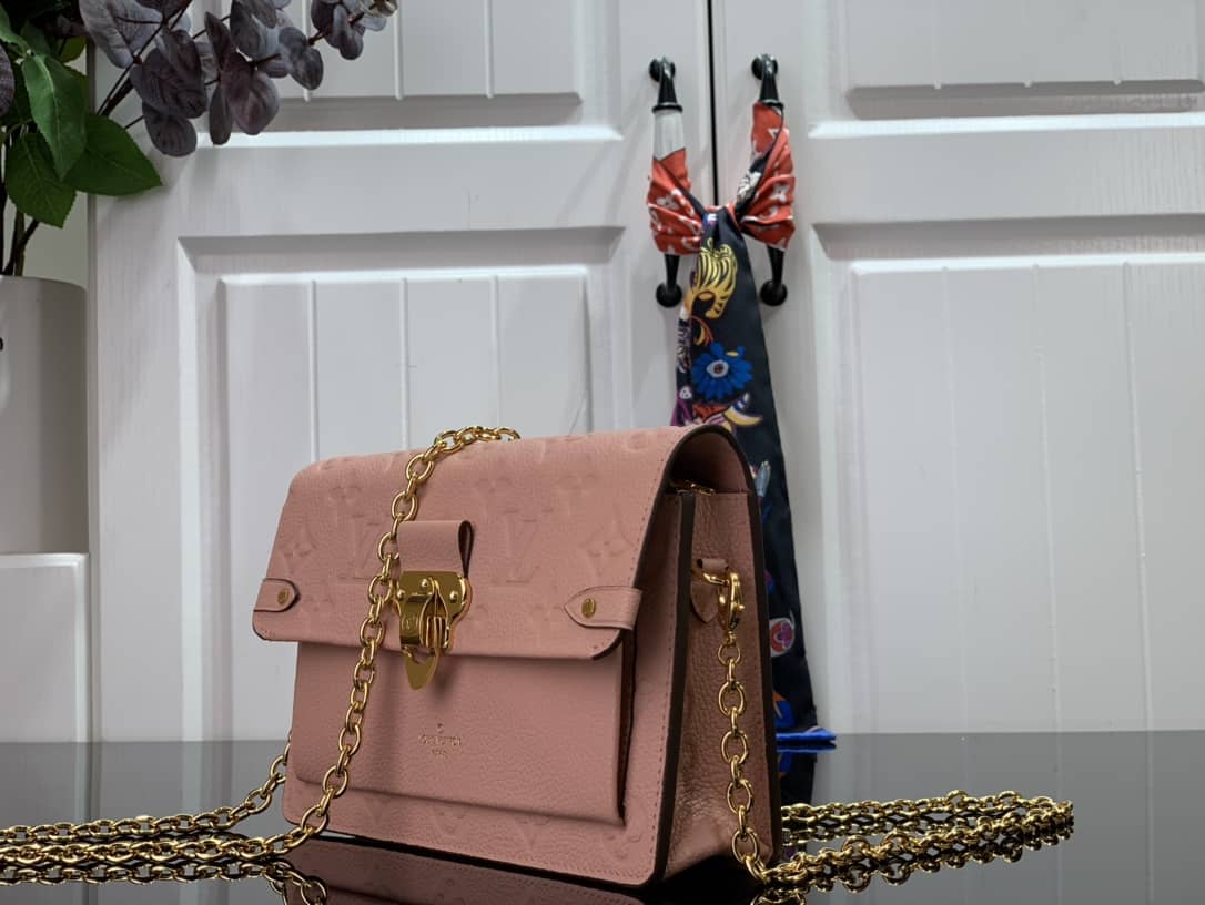 Best Replica Louis Vuitton Vavin Chain Empreinte Leather Replica Bag Pink M63398 - Colareps