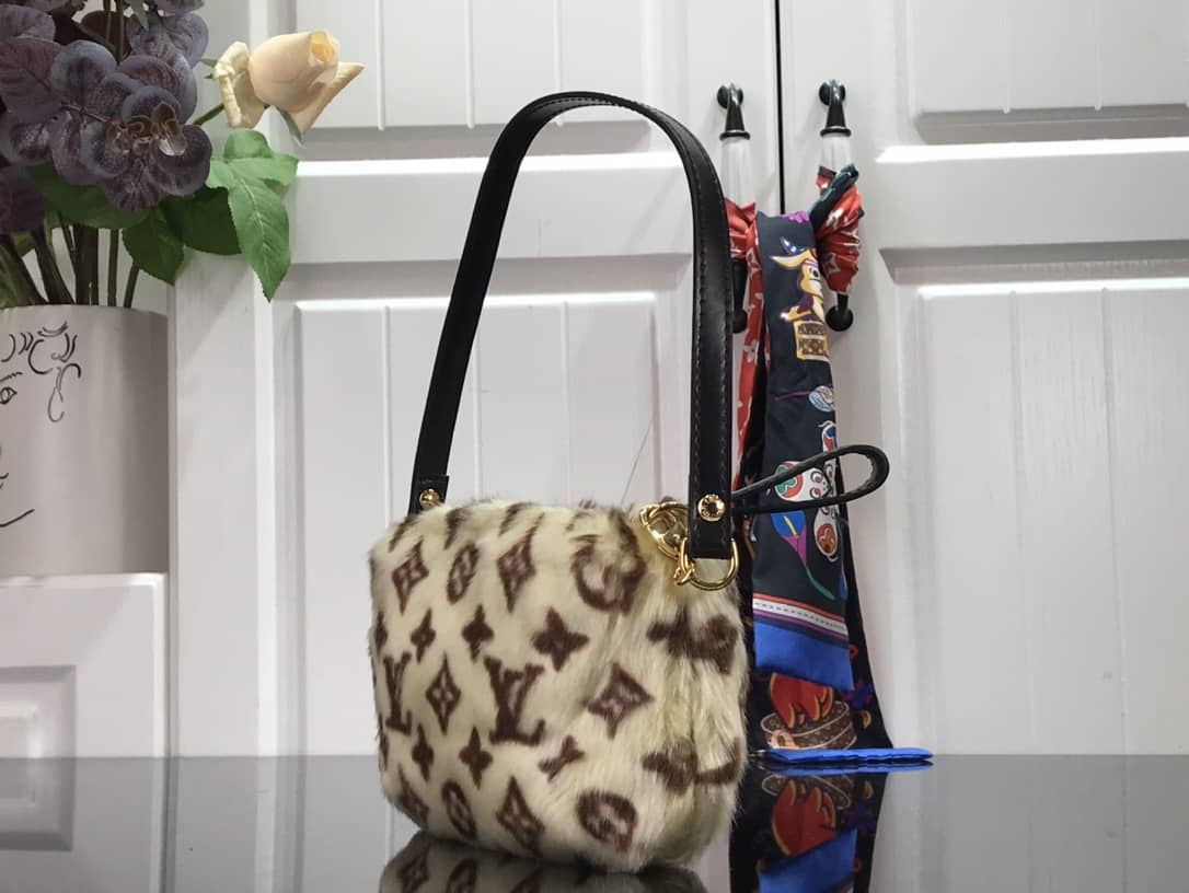 Best Replica Louis Vuitton Mink Monogram Vision Milla PM Pochette - Colareps