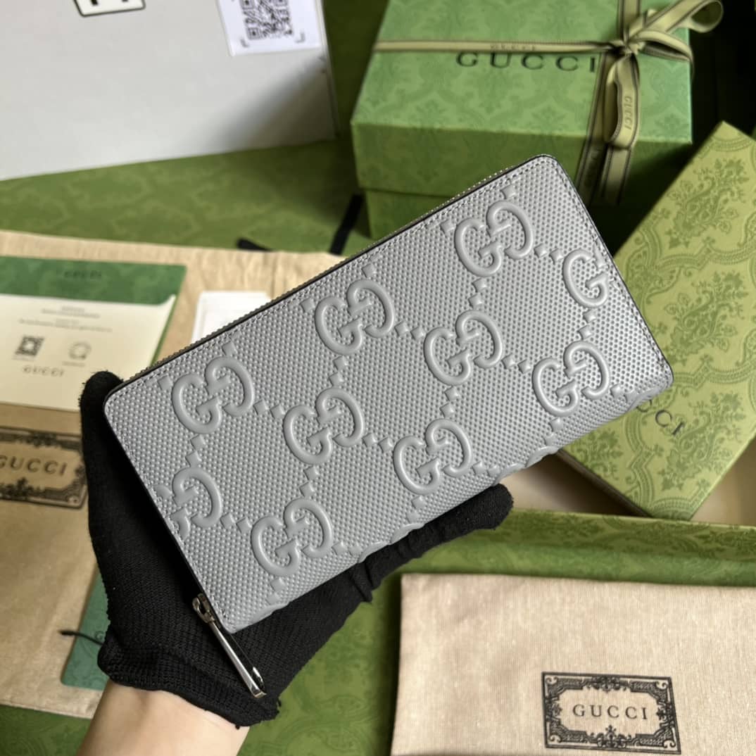 Best Replica Gucci Mens GG Embossed Zip Replica Wallet 625558 - Colareps