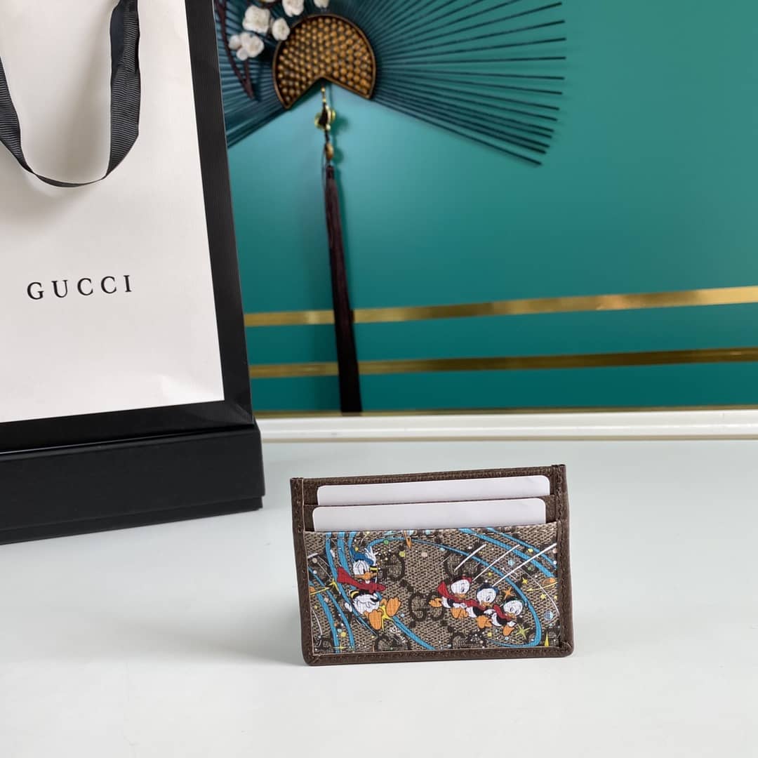 Best Replica Gucci x Disney Donald Duck Credit Card Holder Replica 647942 - Colareps