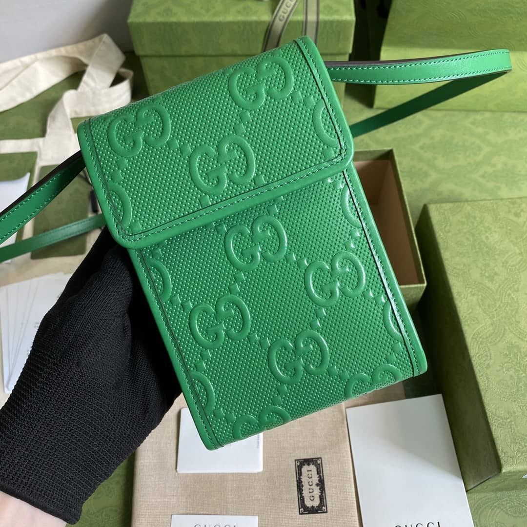 Best Replica Gucci GG Embossed Mini Phone Bag Replica 625571 - Colareps