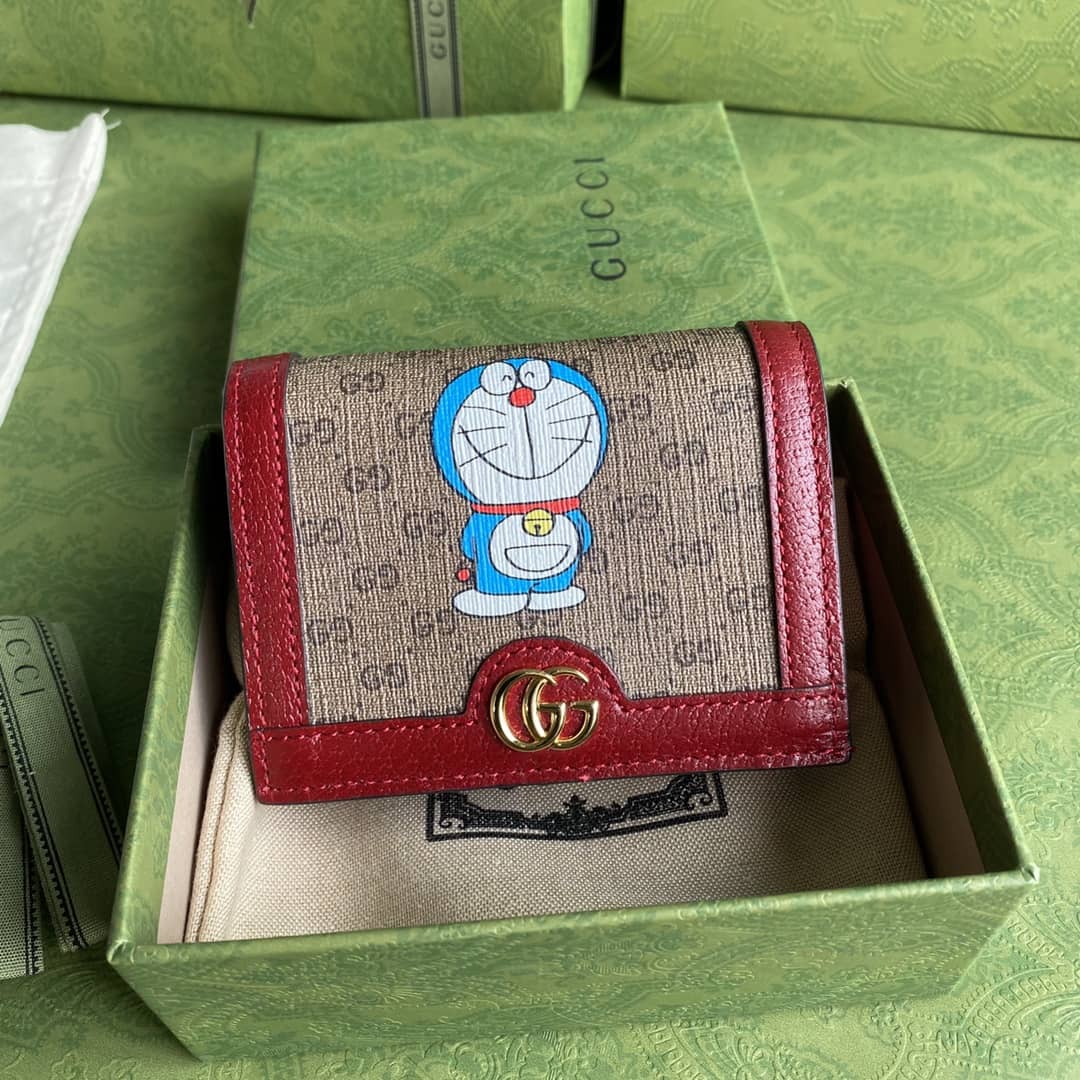 Best Replica Gucci x Doraemon GG Supreme Mini Folded Wallet Replica 647788 - Colareps