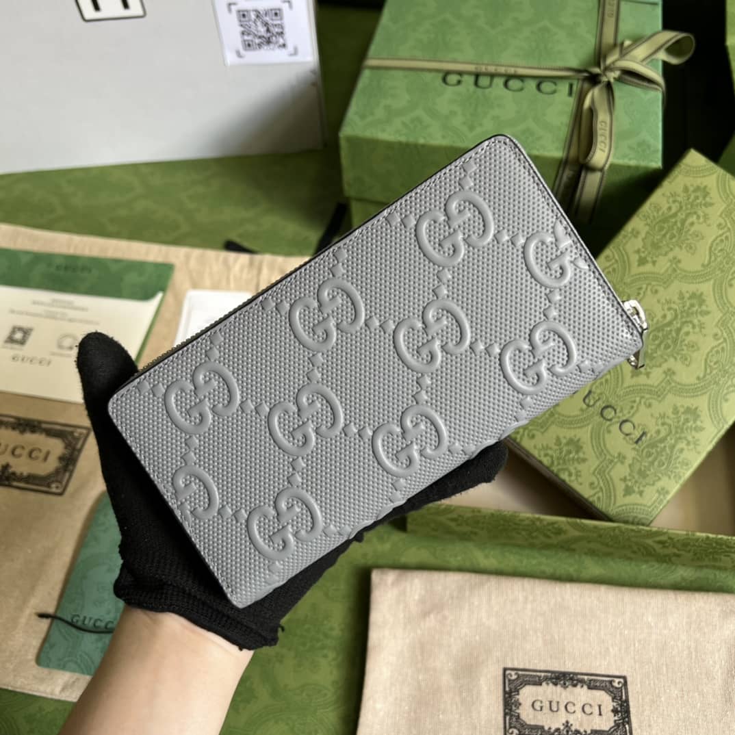 Best Replica Gucci Mens GG Embossed Zip Replica Wallet 625558 - Colareps