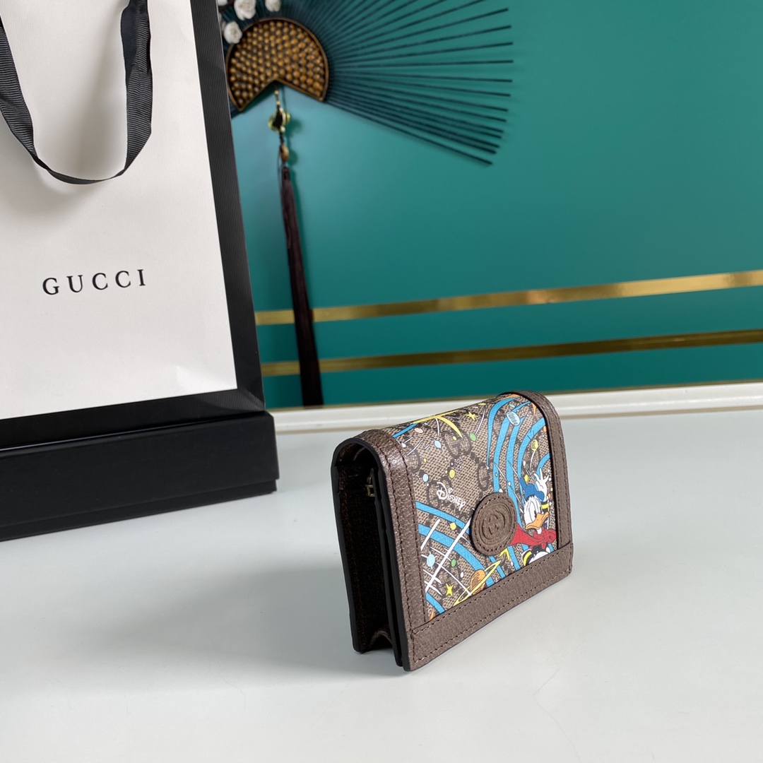Best Replica Gucci Disney Donald Duck Compact Wallet Replica 648121 - Colareps