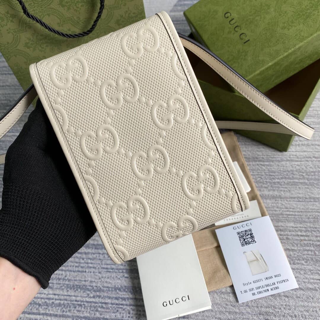 Best Replica Gucci GG Embossed Leather Mini Messenger Bag Replica White 625571 - Colareps