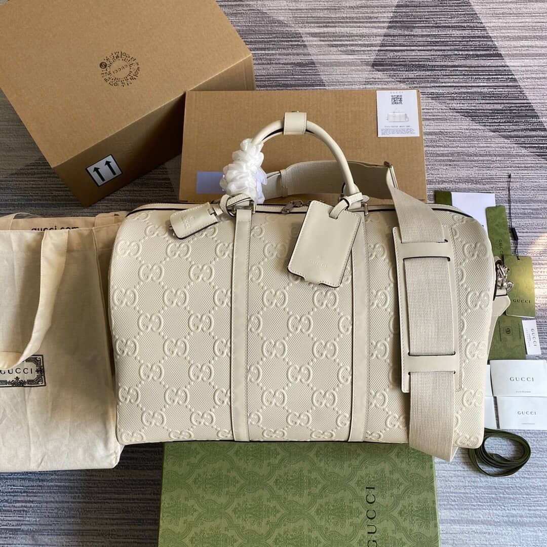 Best Replica Gucci GG Embossed Perforated Leather Duffle Bag Replica White 625768 - Colareps