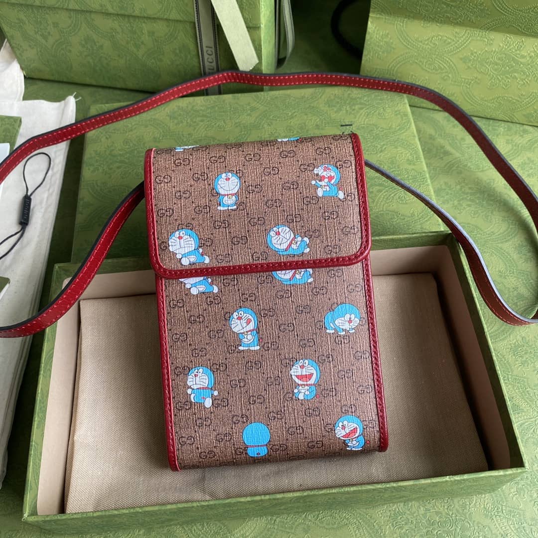 Best Replica Gucci X Doraemon Mini Canvas Phone Bag Replica 647805 - Colareps