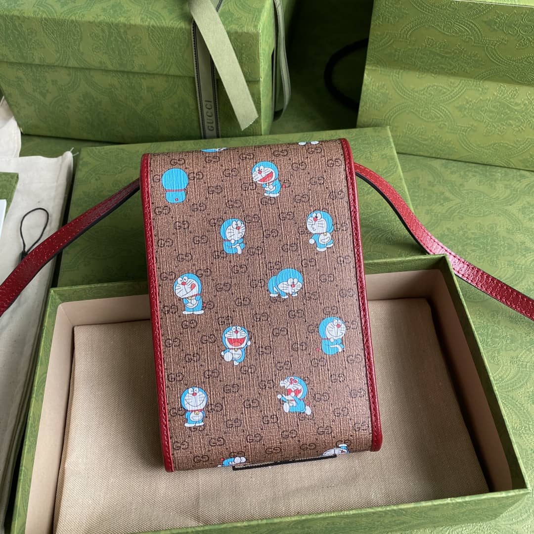 Best Replica Gucci X Doraemon Mini Canvas Phone Bag Replica 647805 - Colareps