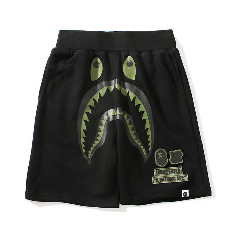 Best Replica BAPE x Undefeated Shorts Shark Camo Green Black Pants HDCP8653 - Colareps
