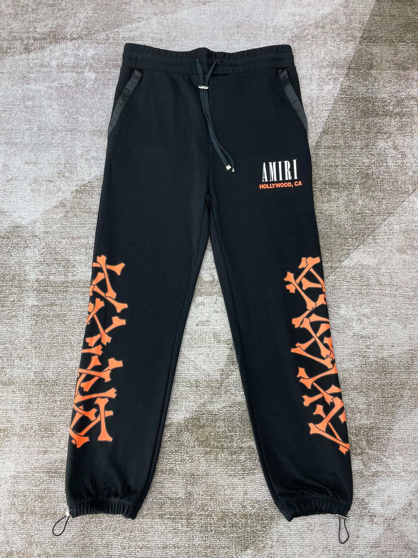 Best Replica 1:1 quality version Orange bone-printed pants - Colareps