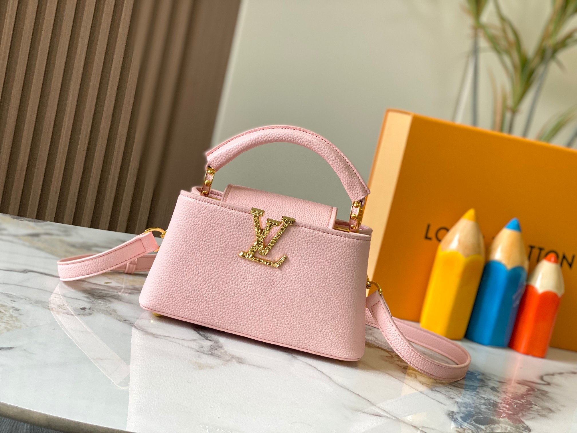 Best Replica Louis Vuitton Capucines East West calf leather mini bag replica - Colareps