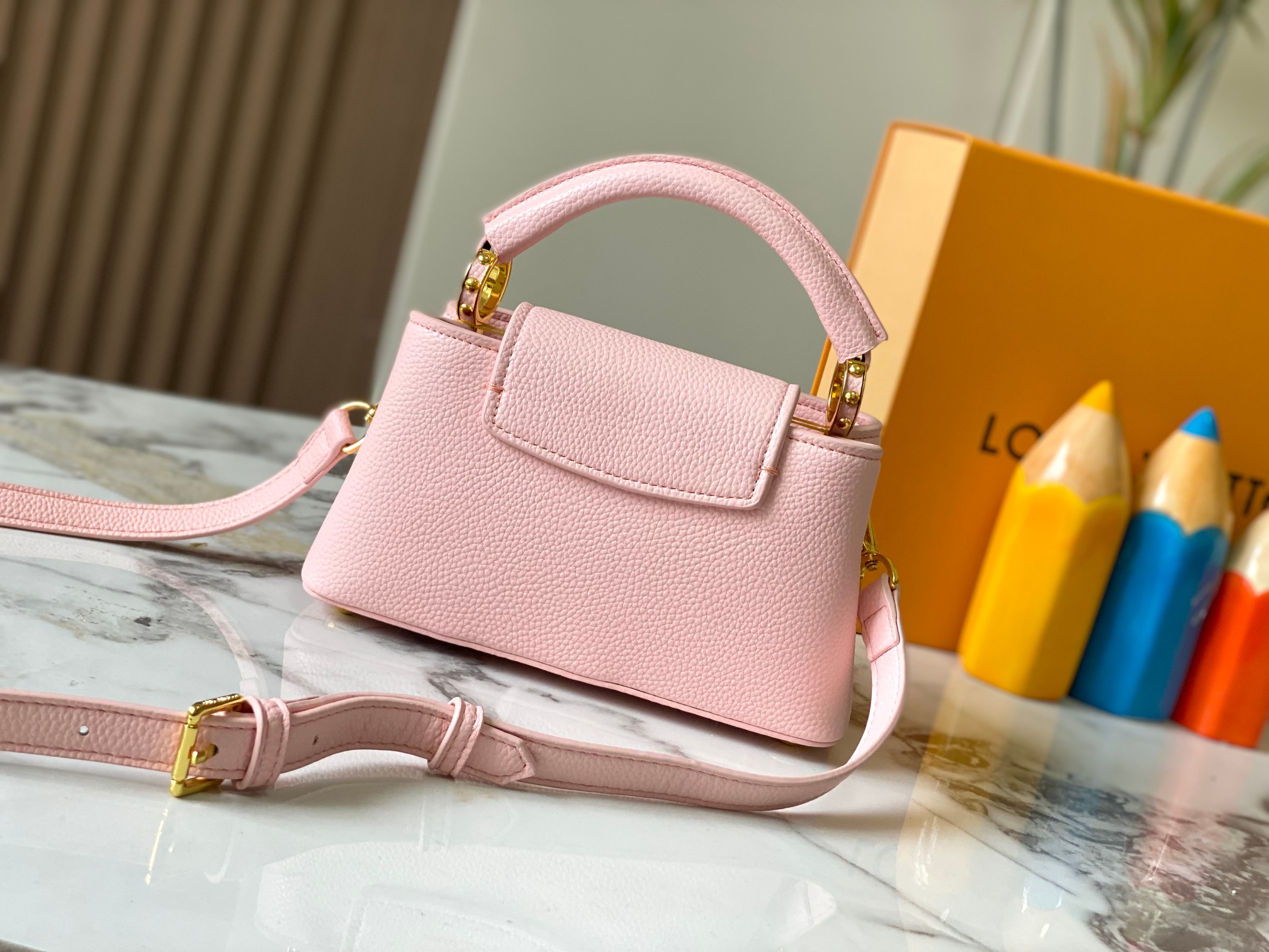 Best Replica Louis Vuitton Capucines East West calf leather mini bag replica - Colareps