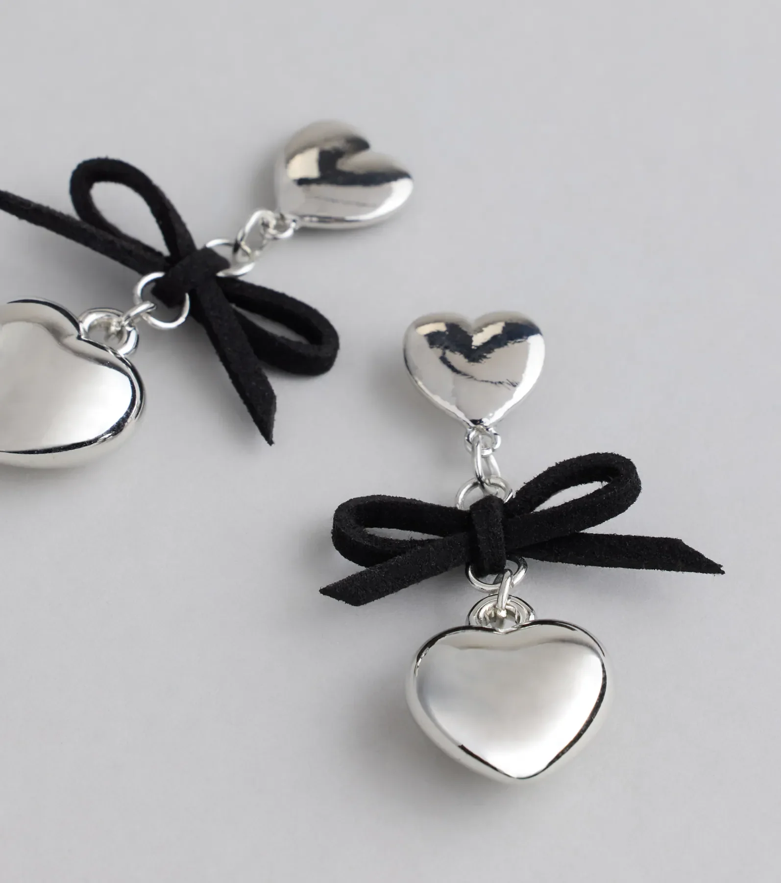 Sweet Talker Heart And Bow Drop Earrings