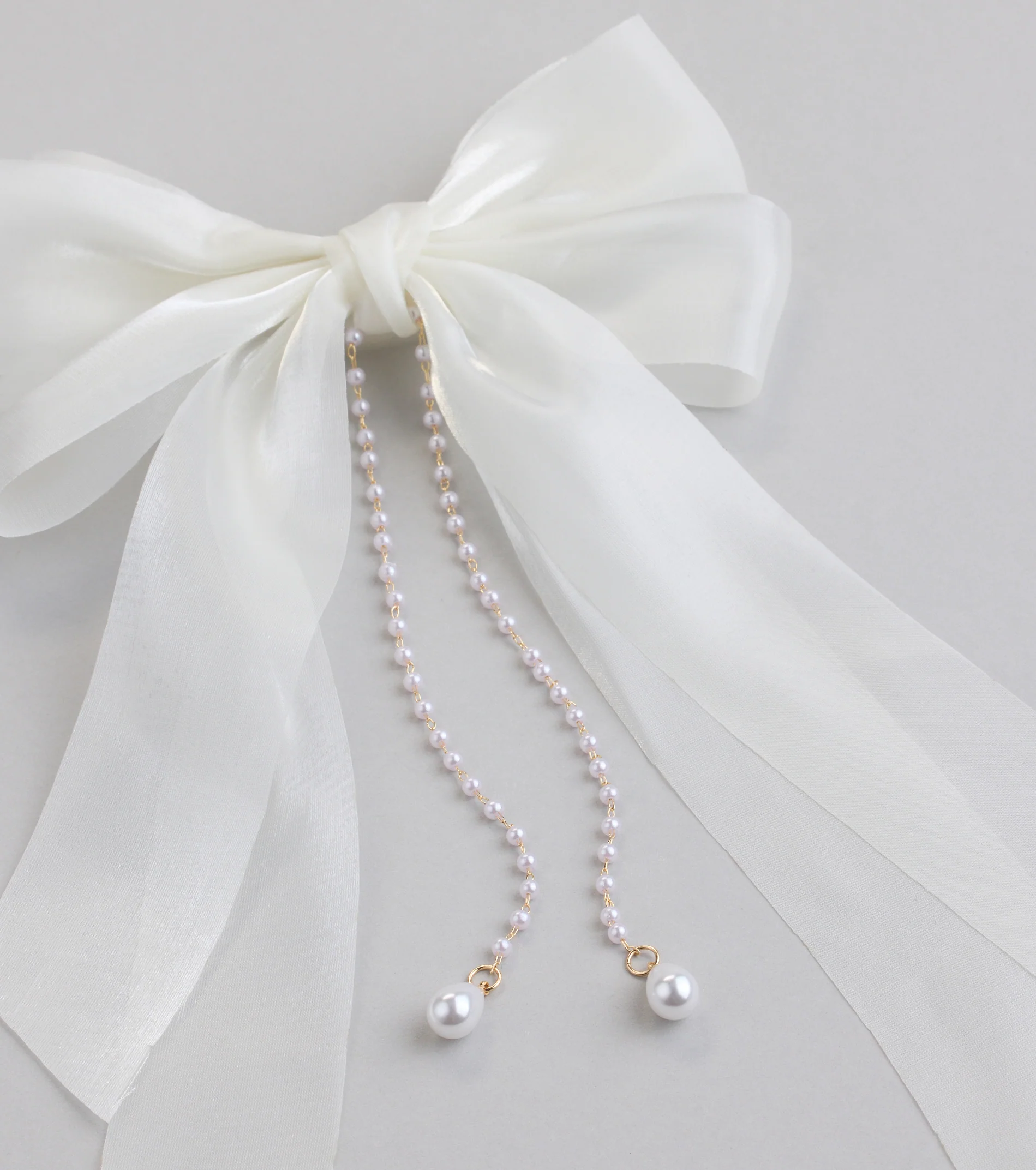 Ever So Charmed Hair Bow With Pearl Chain