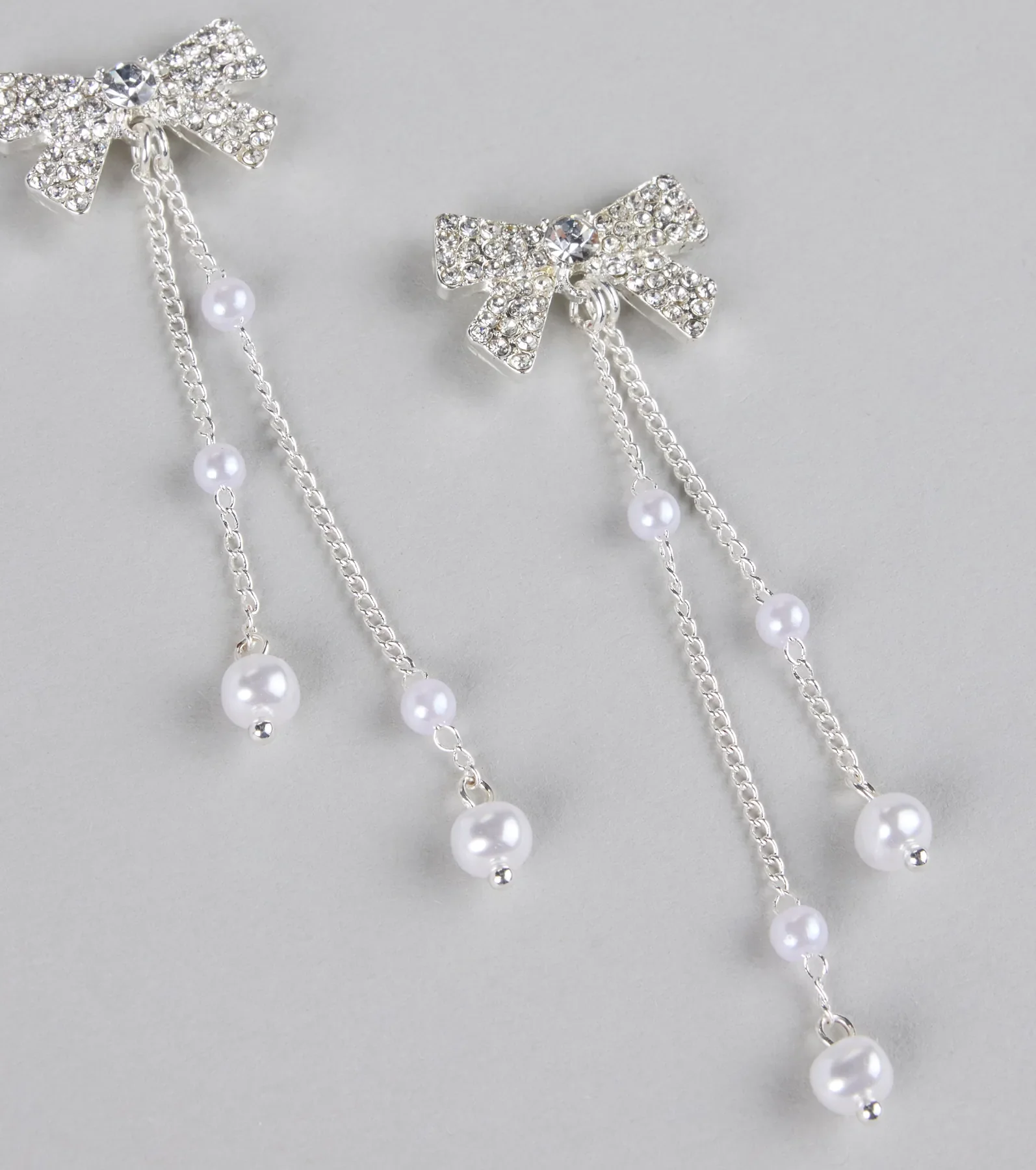 Darling Drama Rhinestone Bow Pearl Drop Earrings