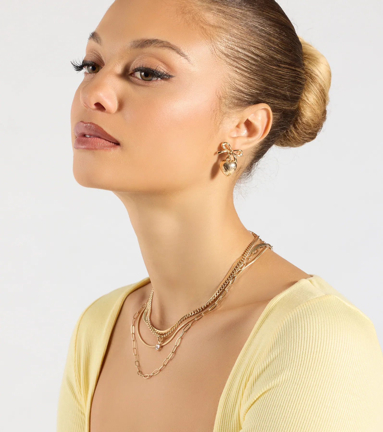 Poised Heart Bow Earrings