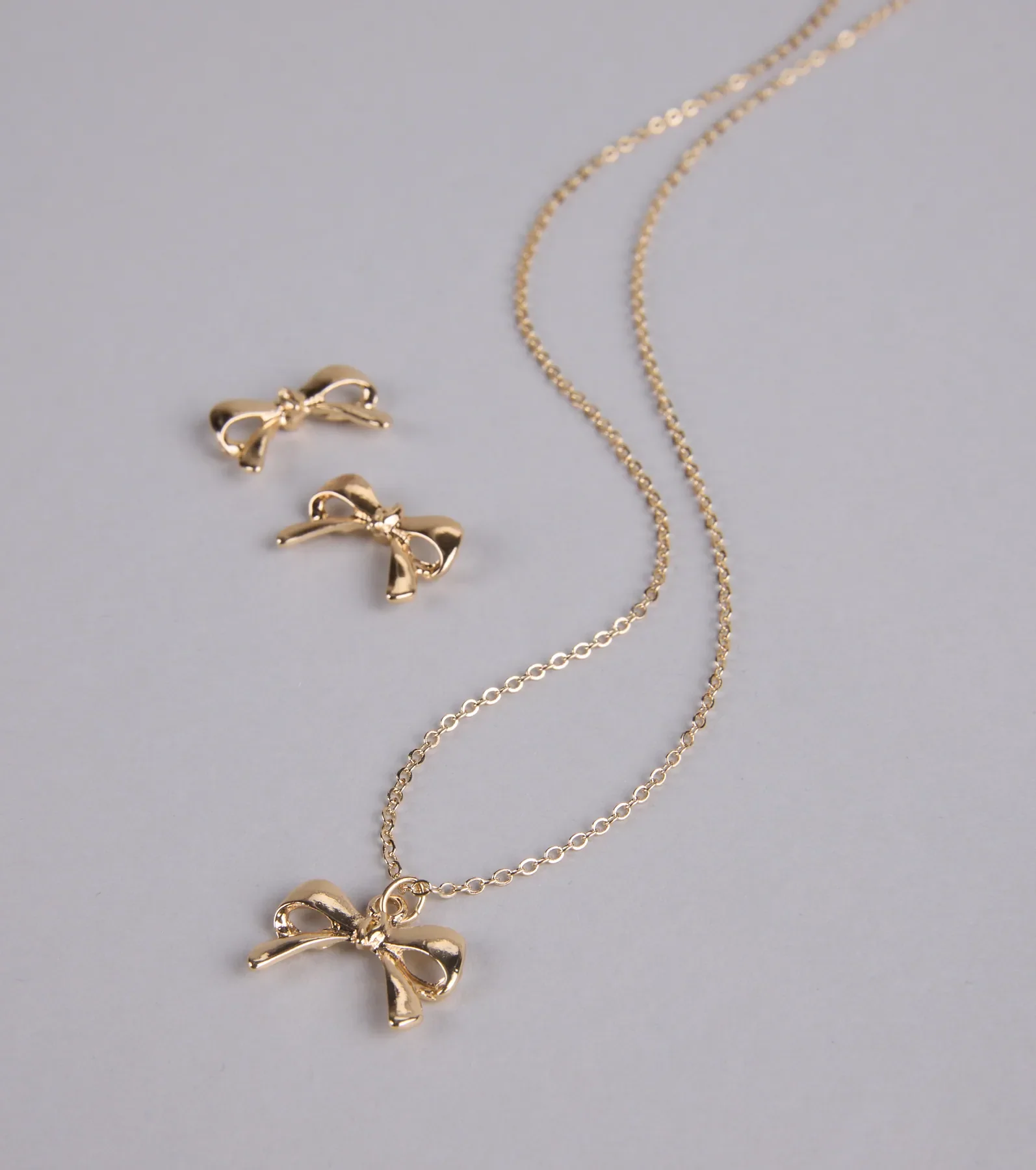 So Charming Bow Necklace And Stud Earrings Set