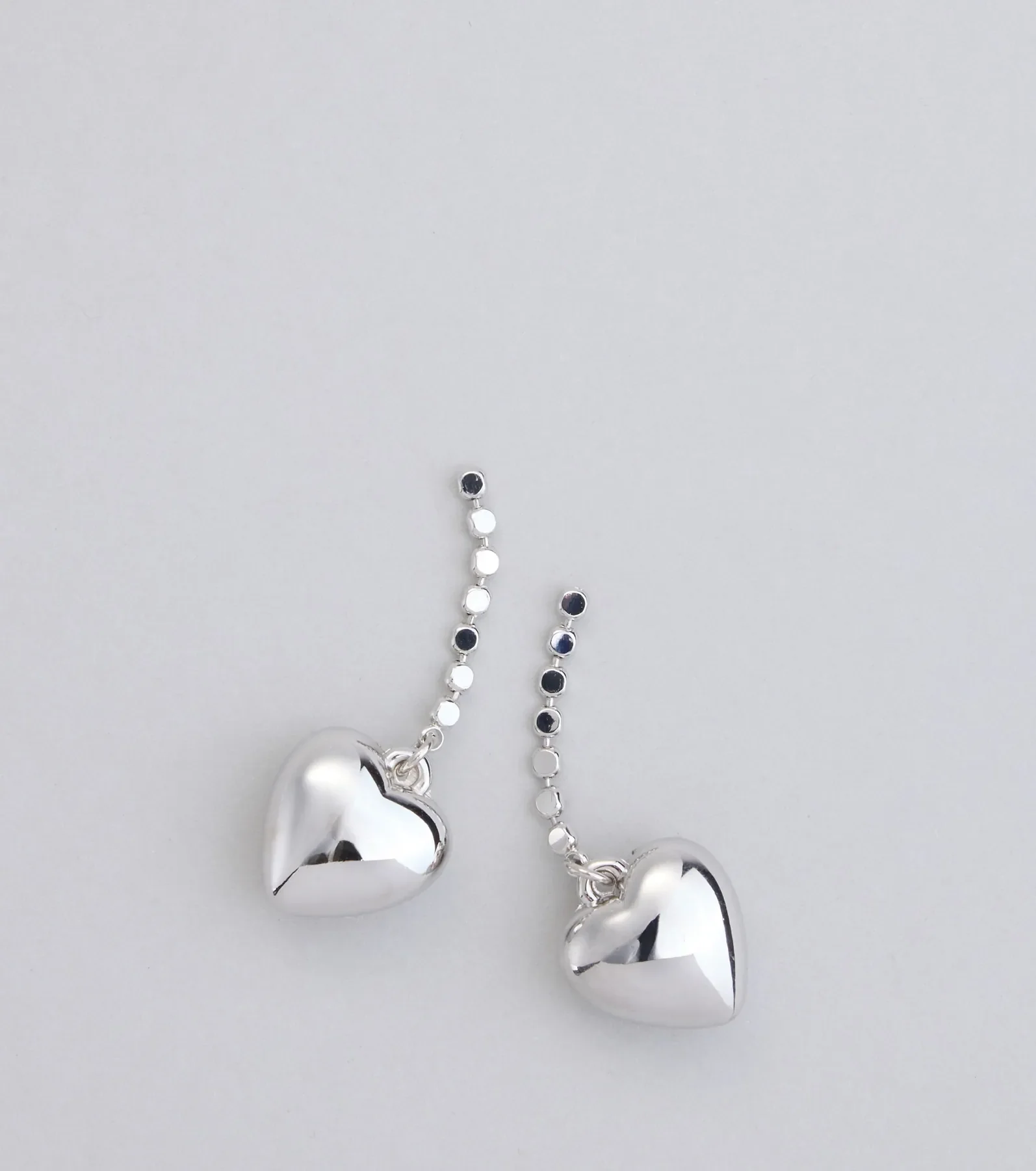Taking Heart Charm Earrings