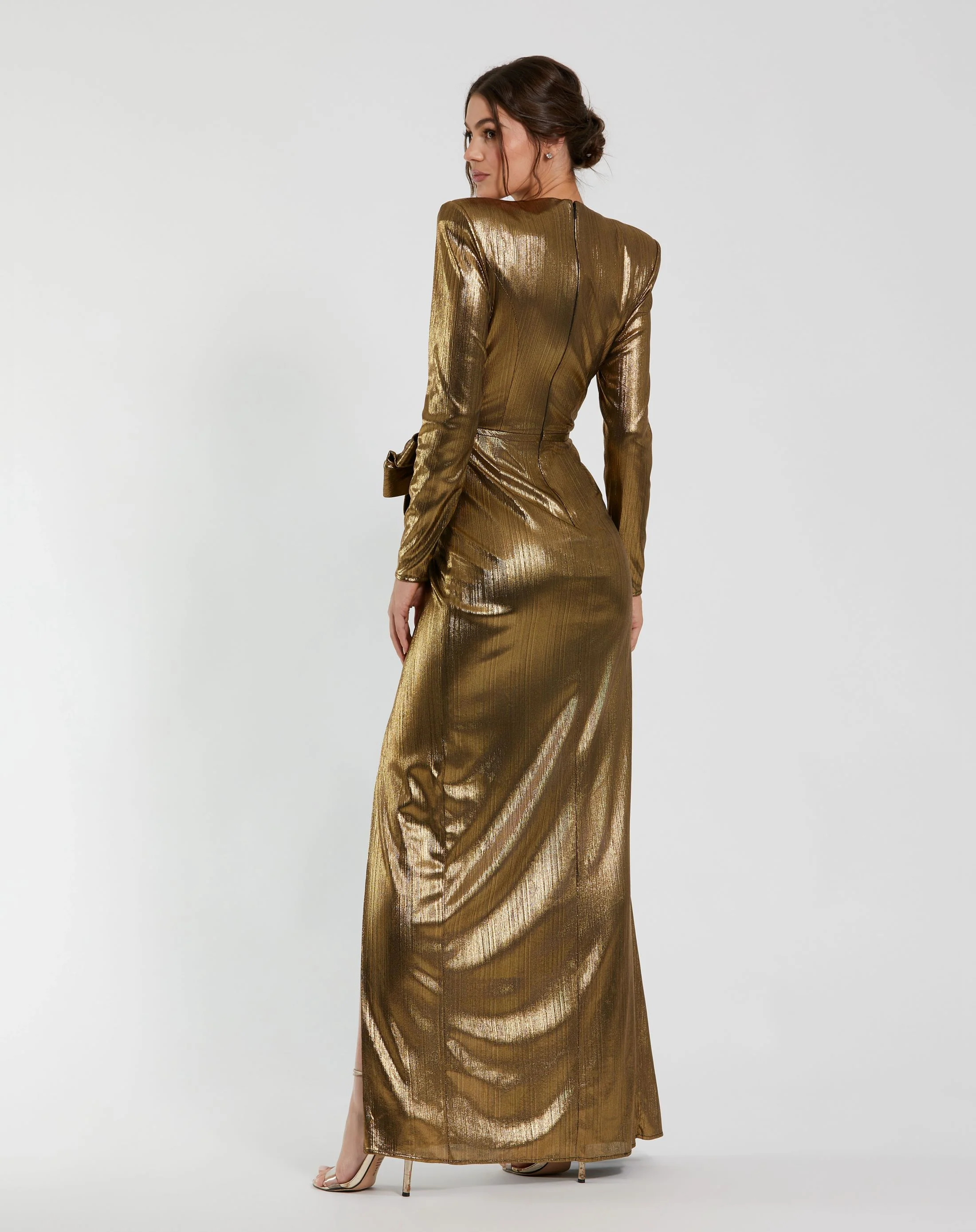 Gold Metallic Jersey Long Sleeve Gown With Bow