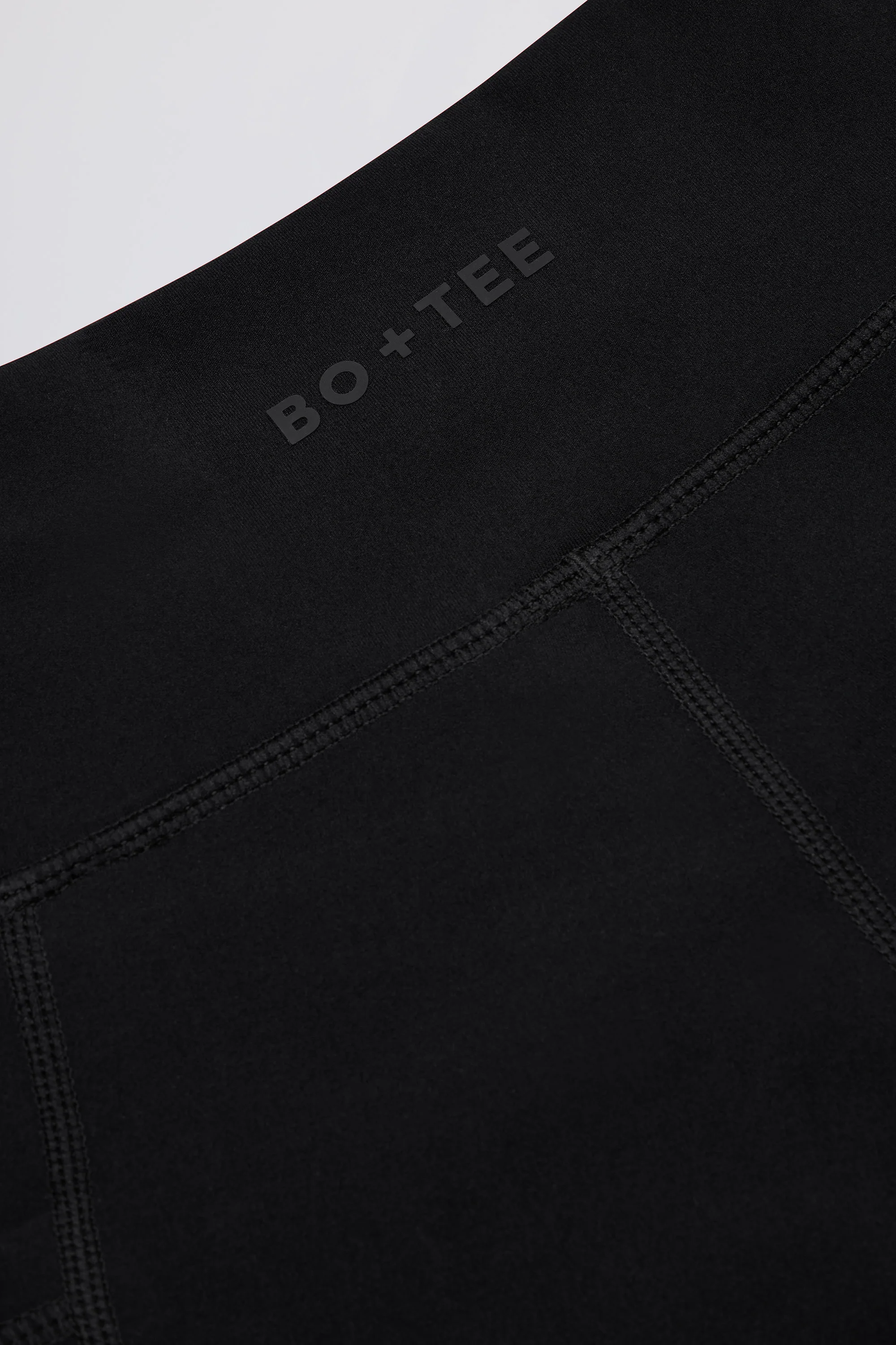 Soft Active Crossover Pocket Shorts in Black