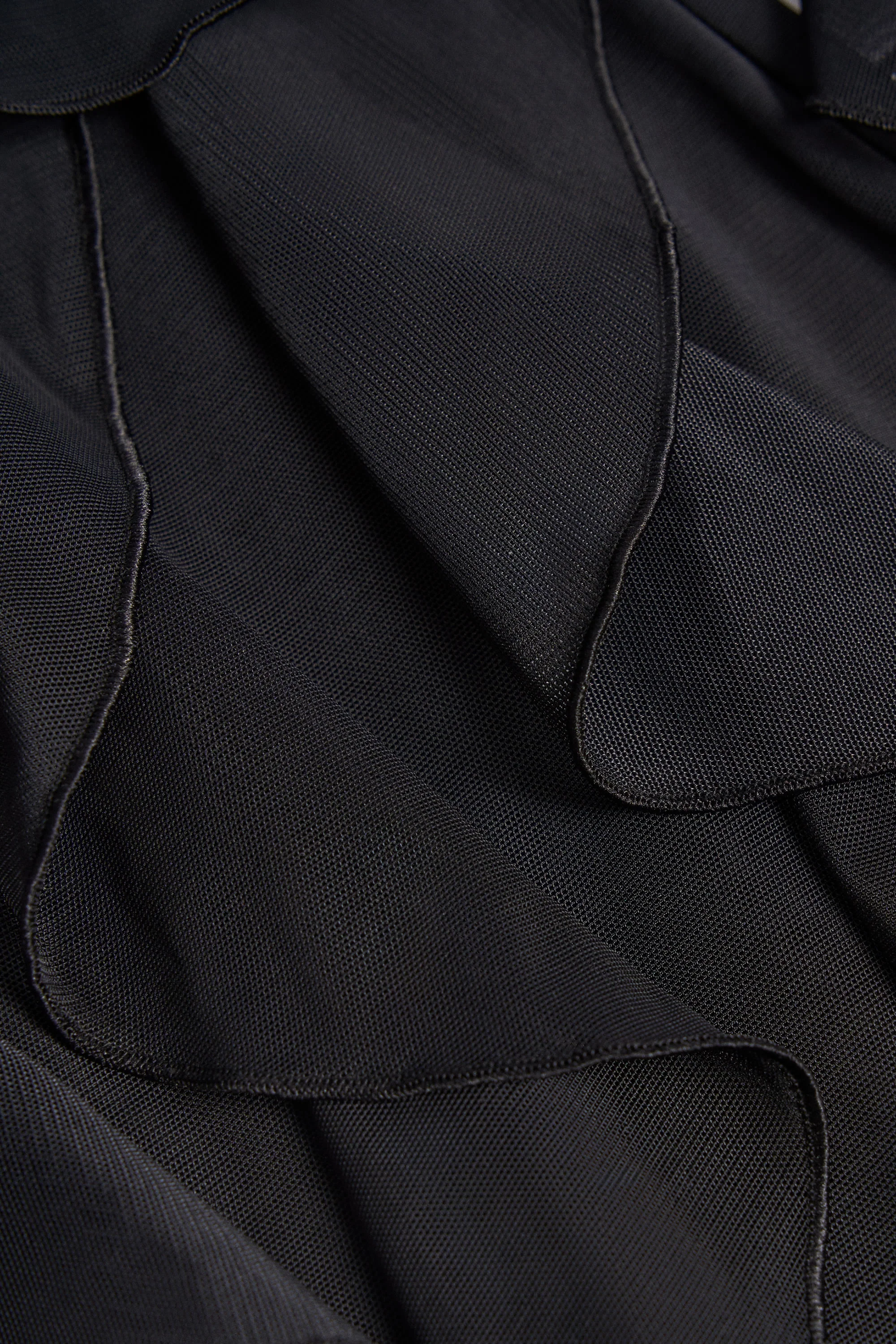 Ruffled Mid-Rise Flared Trousers in Black