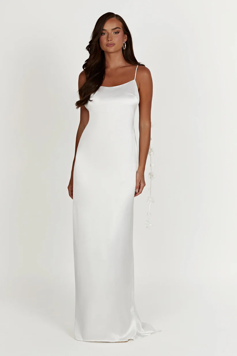 Elegant White Spaghetti Strap Maxi Dress with Textured Floral Accents