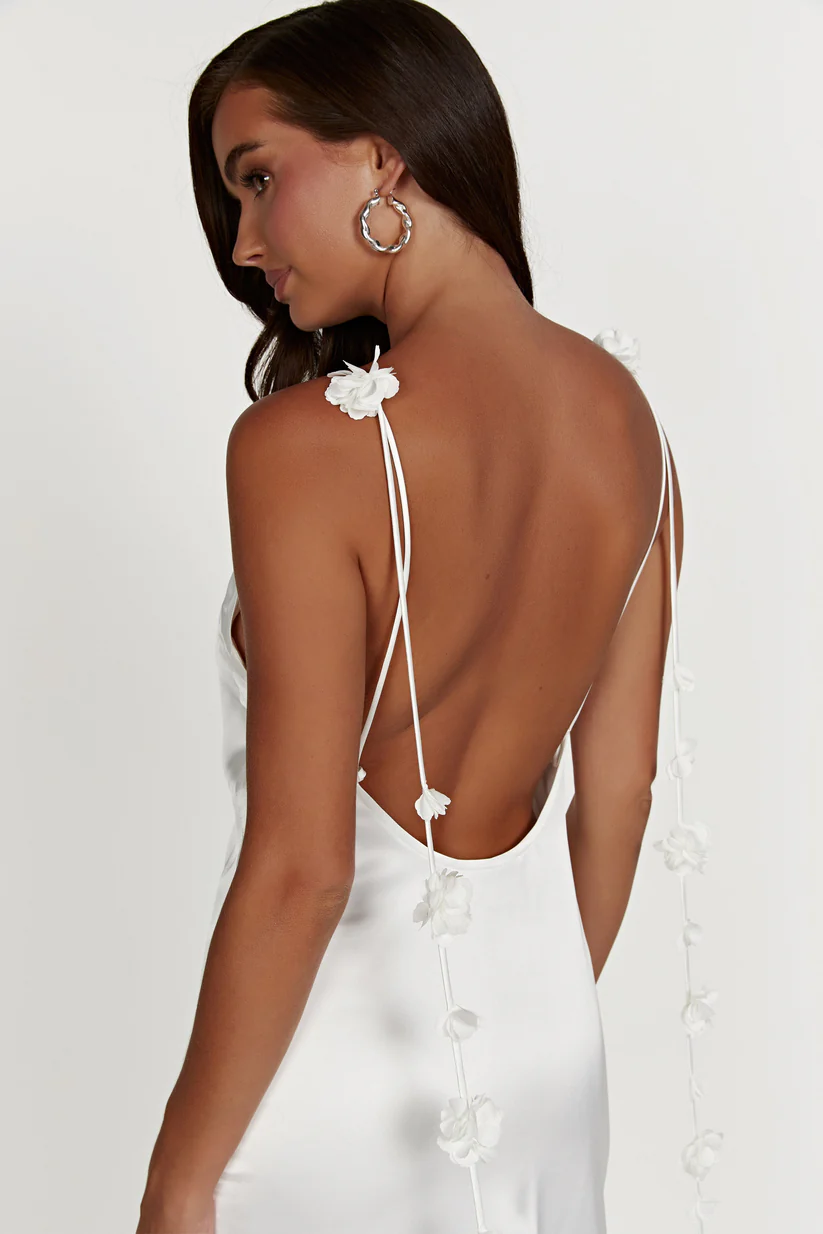 Elegant White Spaghetti Strap Maxi Dress with Textured Floral Accents