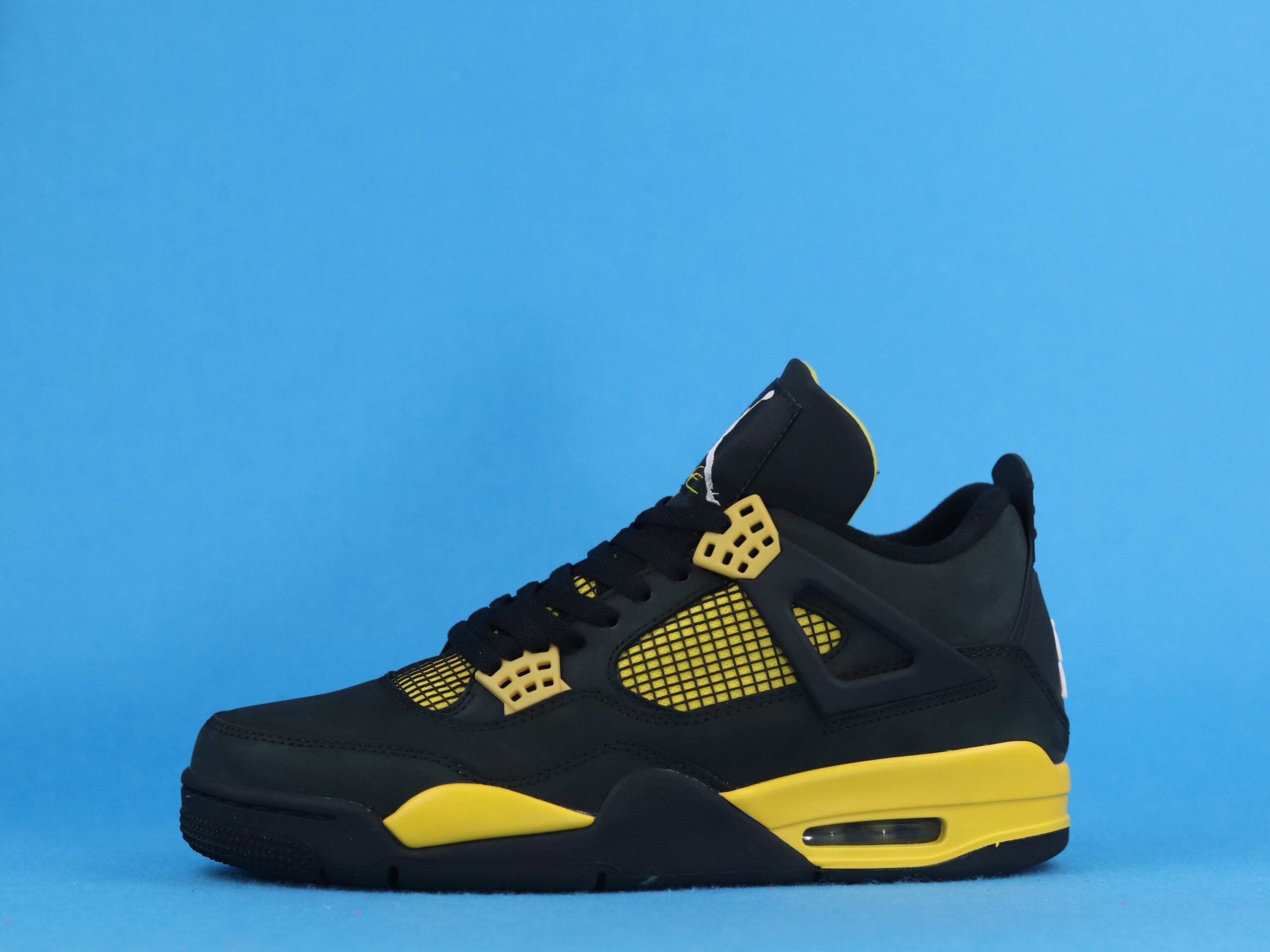 Air Jordan 4 Retro Thunder Yellow