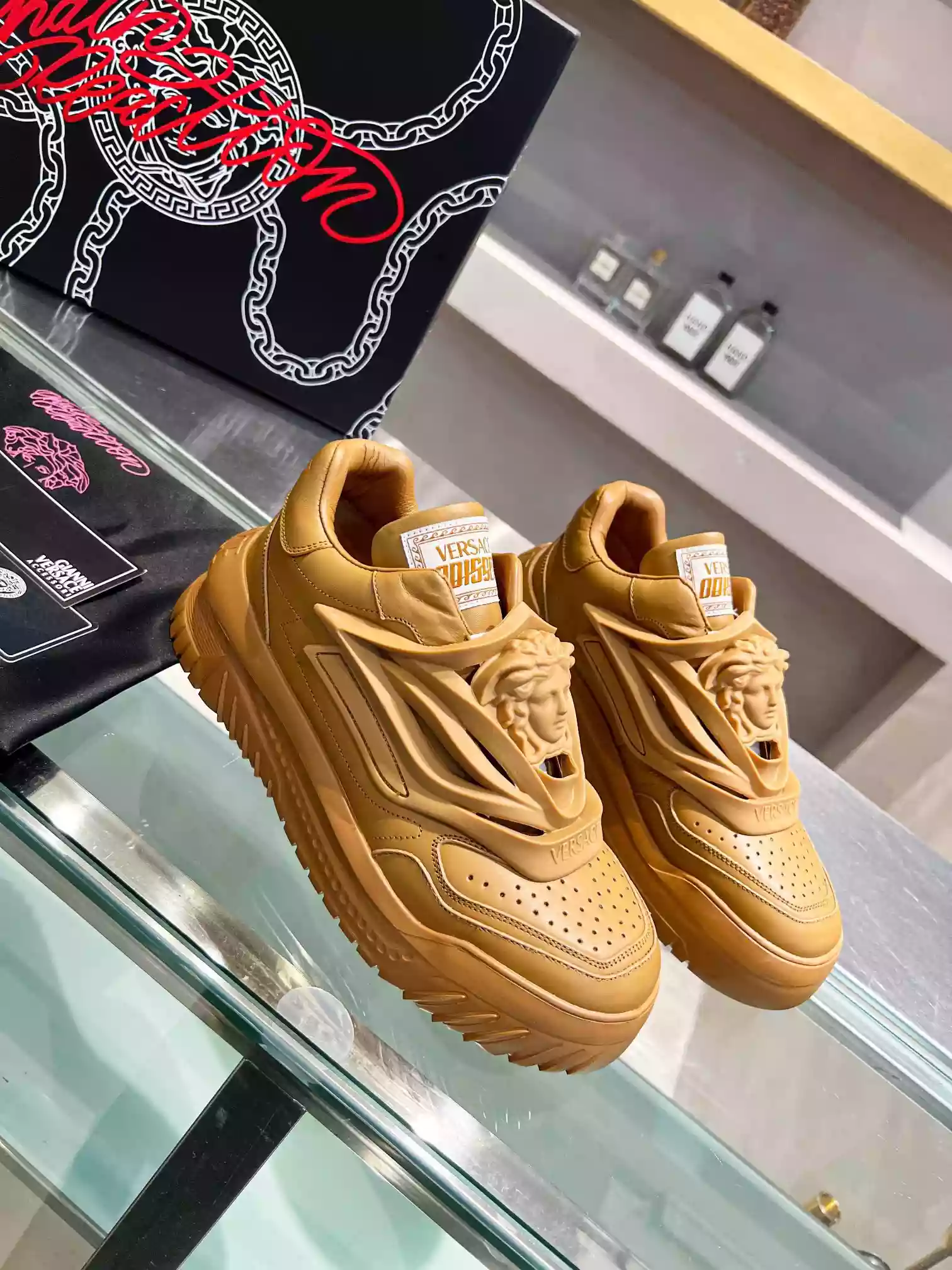 VERSACE WOMEN’S ODISSEA SNEAKERS IN BROWN LEATHER – VSS016